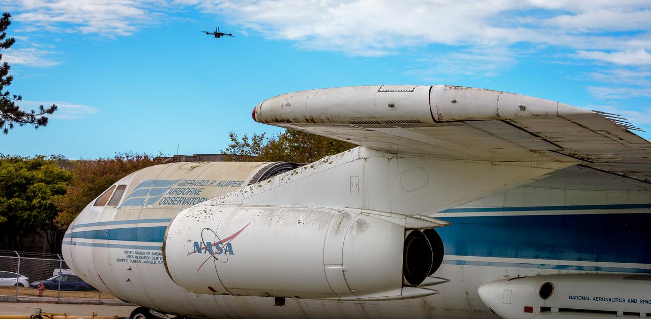 The drone follows an autonomously defined path around the modified C-141 Kuiper Airborne Observatory, (KAO) (NASA-714), on the N211 apron.  The drone photographs the aircraft with a visible and infrared camera which are processed using a photogrammetry software package called Pix4D that converts them into a 3D model.  Scanning the aircraft is the first phase of documenting the aircraft demolition as well as an opportunity to train pilots to operate the Pix4D software.