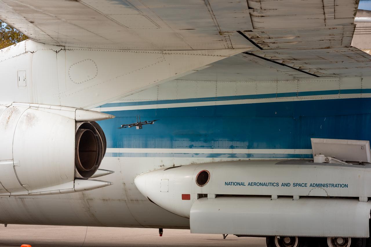 The drone follows an autonomously defined path around the modified C-141 Kuiper Airborne Observatory, (KAO) (NASA-714), on the N211 apron.  The drone photographs the aircraft with a visible and infrared camera which are processed using a photogrammetry software package called Pix4D that converts them into a 3D model.  Scanning the aircraft is the first phase of documenting the aircraft demolition as well as an opportunity to train pilots to operate the Pix4D software.