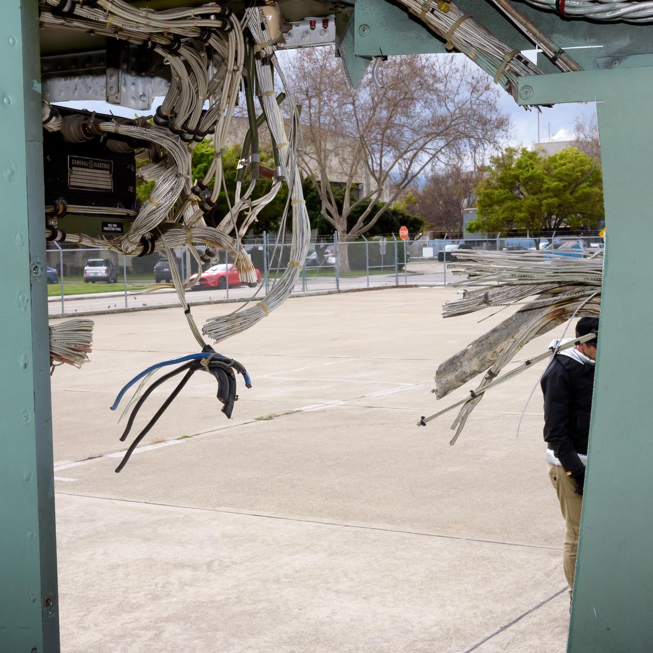 Cables in the modified C-141 Kuiper Airborne Observatory, (KAO) (NASA-714), severed prior to removing the cockpit on the N211 apron at Moffett Field, California.