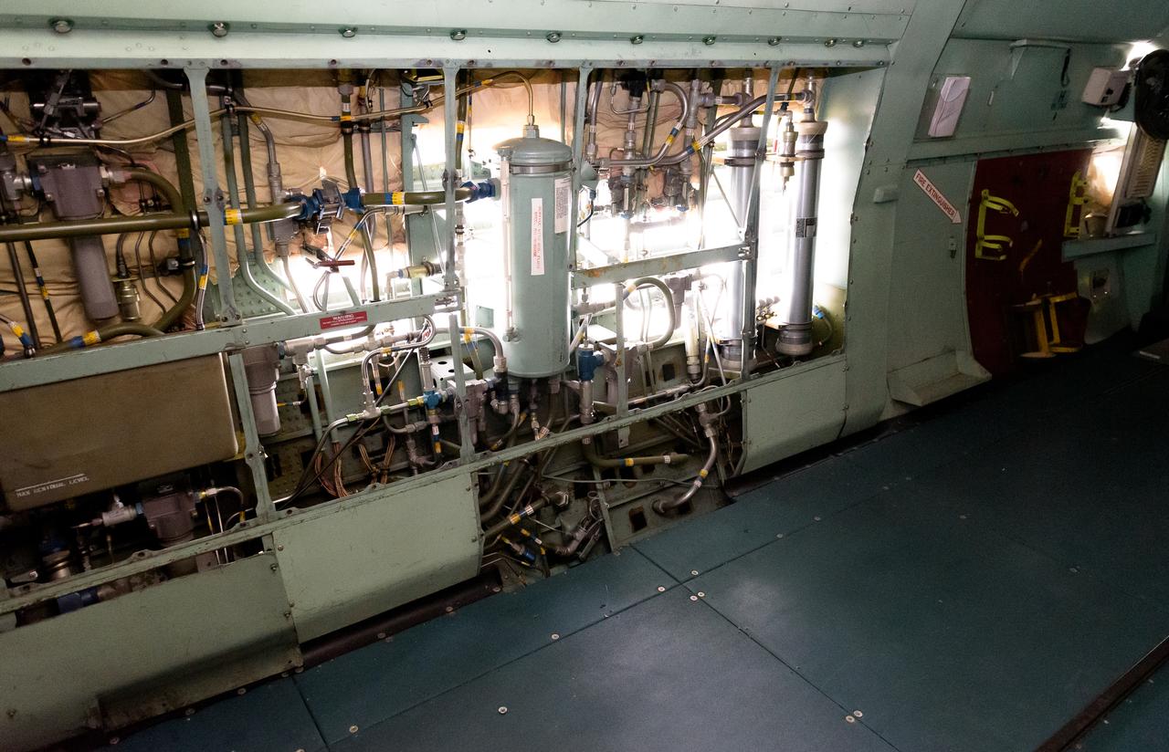 Daylight shines through the airframe of the modified C-141 Kuiper Airborne Observatory, (KAO) (NASA-714), fuselage during its demolition on the N211 apron at Moffett Field, California