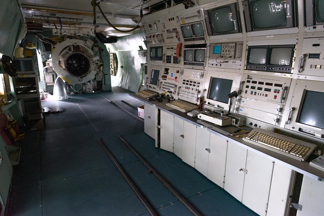 Daylight shines through the airframe of the fuselage onto the mission director’s and telescope operator’s workstations of the modified C-141 Kuiper Airborne Observatory, (KAO) (NASA-714), during its demolition on the N211 apron at Moffett Field, California.