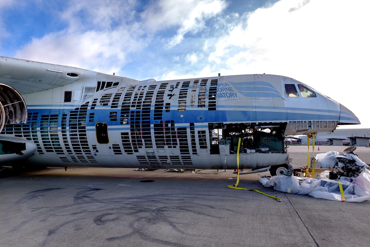 The modified C-141 Kuiper Airborne Observatory, (KAO) (NASA-714), is demolished on the N211 apron at Moffett Field, California.
