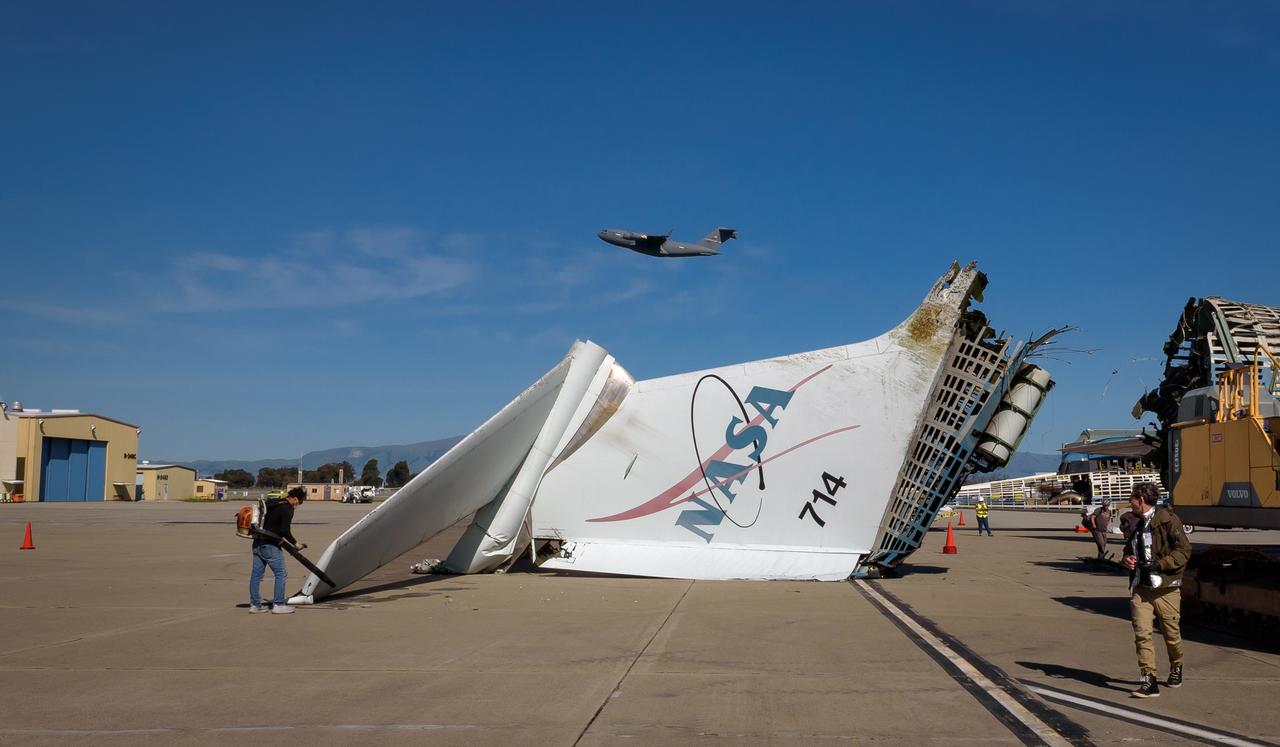 The tail section of the modified C-141 Kuiper Airborne Observatory, (KAO) (NASA-714), severed from the fuselage on the N211 apron of Moffett Field, California.