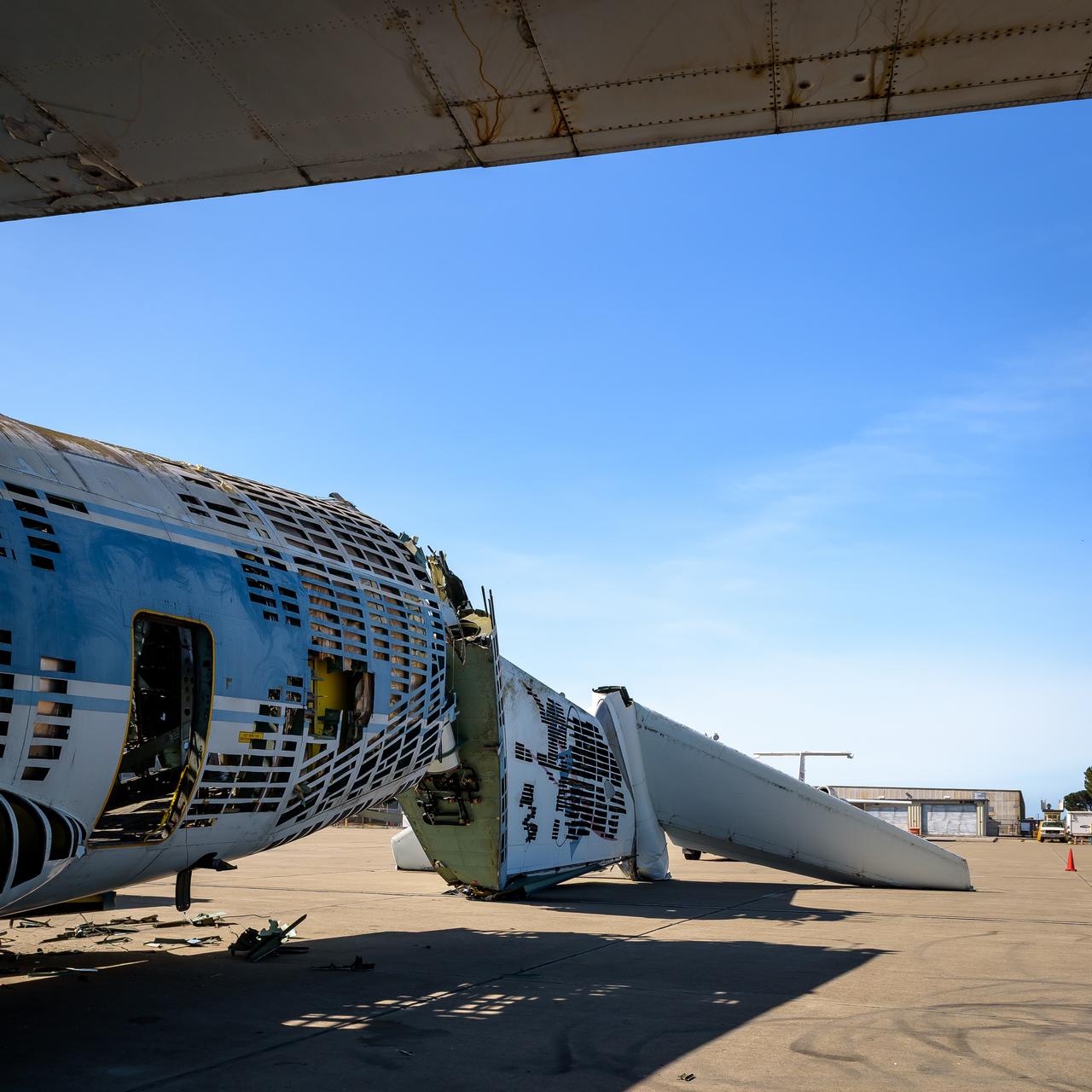 The tail section of the modified C-141 Kuiper Airborne Observatory, (KAO) (NASA-714), severed from the fuselage on the N211 apron of Moffett Field, California.