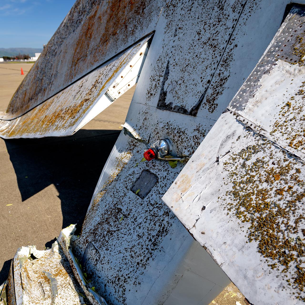 Close-up view of the tail section of the modified C-141 Kuiper Airborne Observatory, (KAO) (NASA-714), severed from the fuselage on the N211 apron at Moffett Field, California.