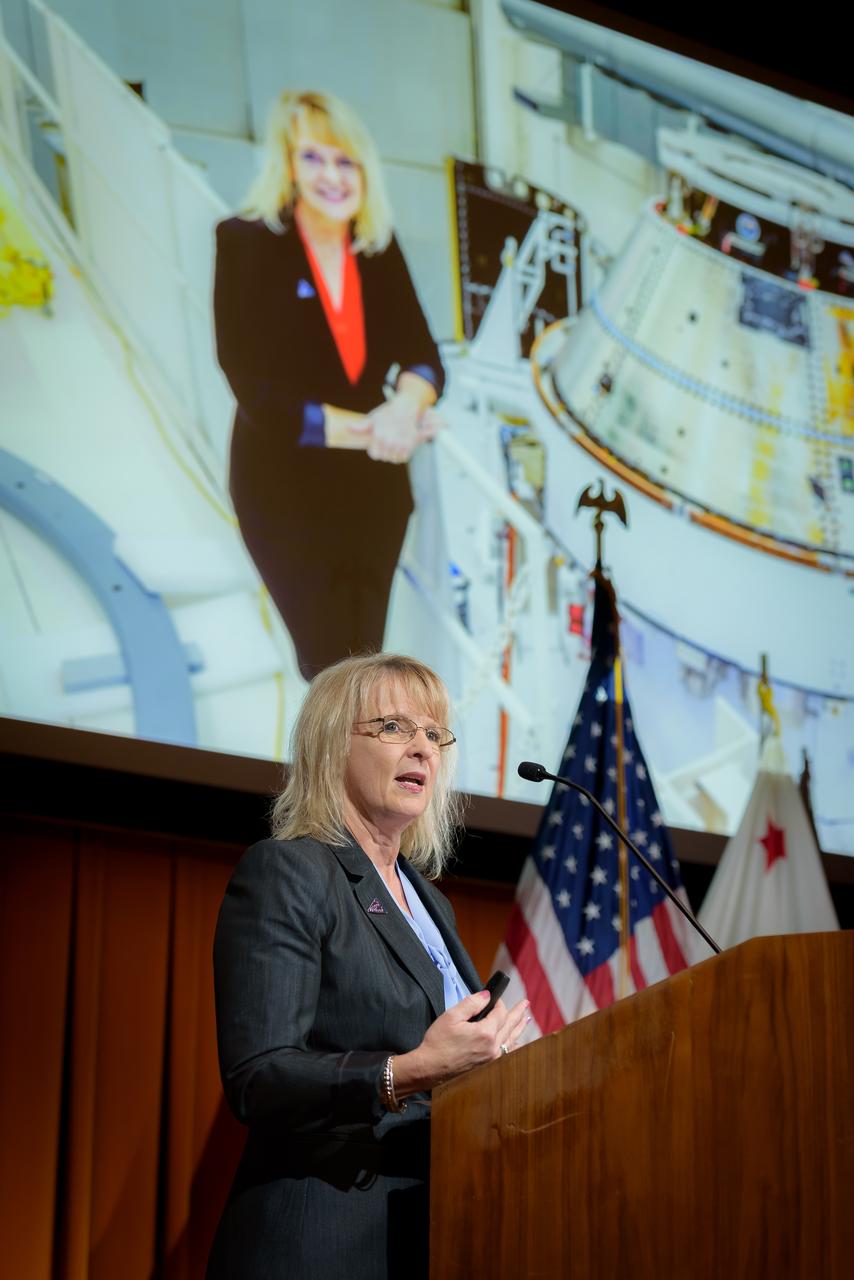 Orion Deputy Program Manager Debbie Korth welcomes Ames employees to the Orion Circle of Excellence Award Ceremony in the Syvertson Auditorium, N201.