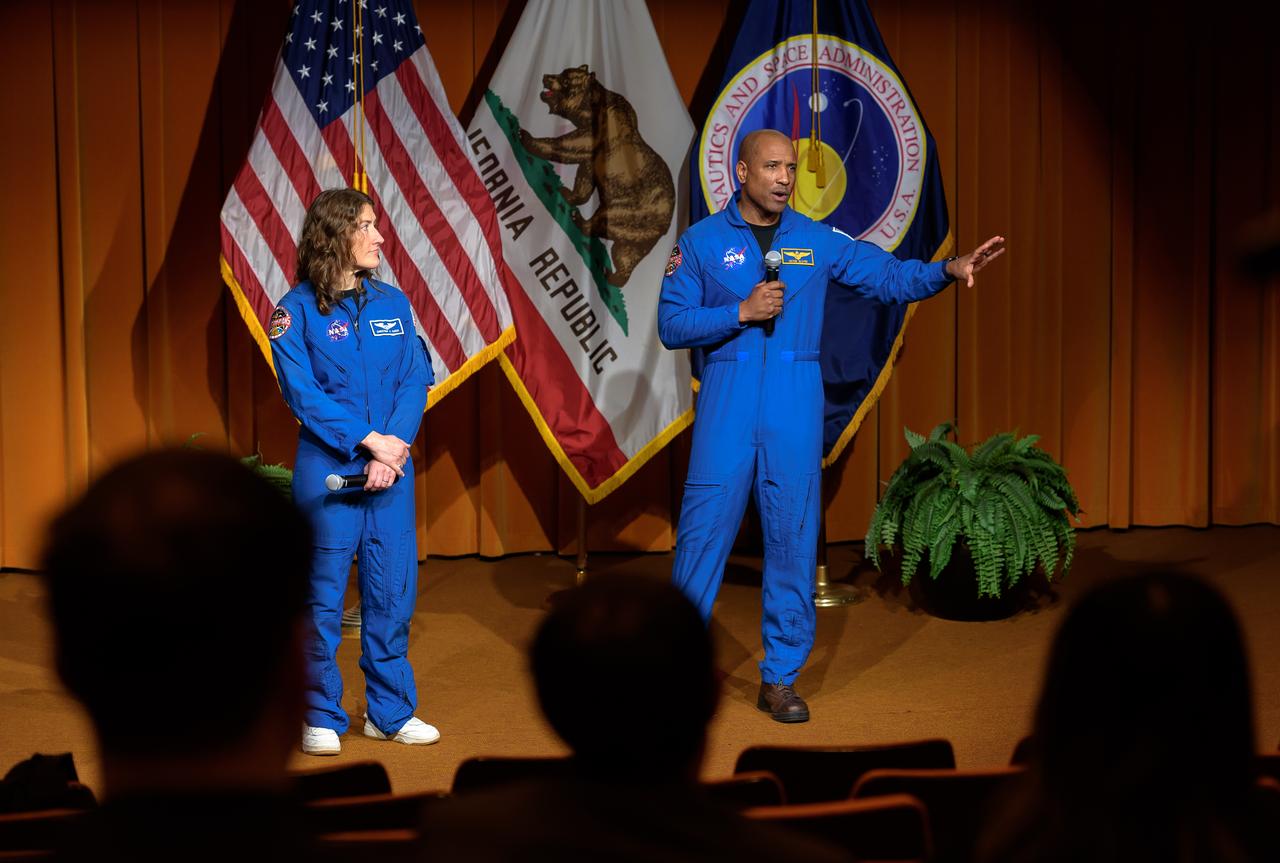 NASA astronauts Christina Koch, left, and Victor J. Glover answer questions from Ames employees following the Orion Circle of Excellence Award Ceremony in the Syvertson Auditorium, N201.