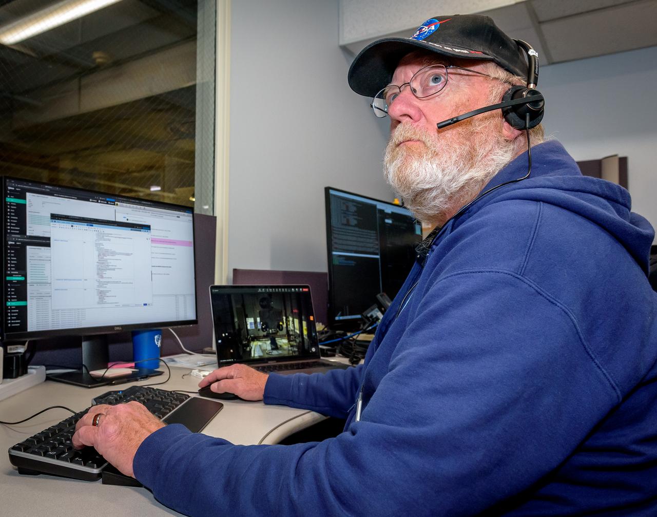 Rusty Hunt during the Volatiles Investigating Polar Exploration Rover (VIPER) vehicle operational readiness test in the Multi-Mission Operations Center (MMOC), N240A.