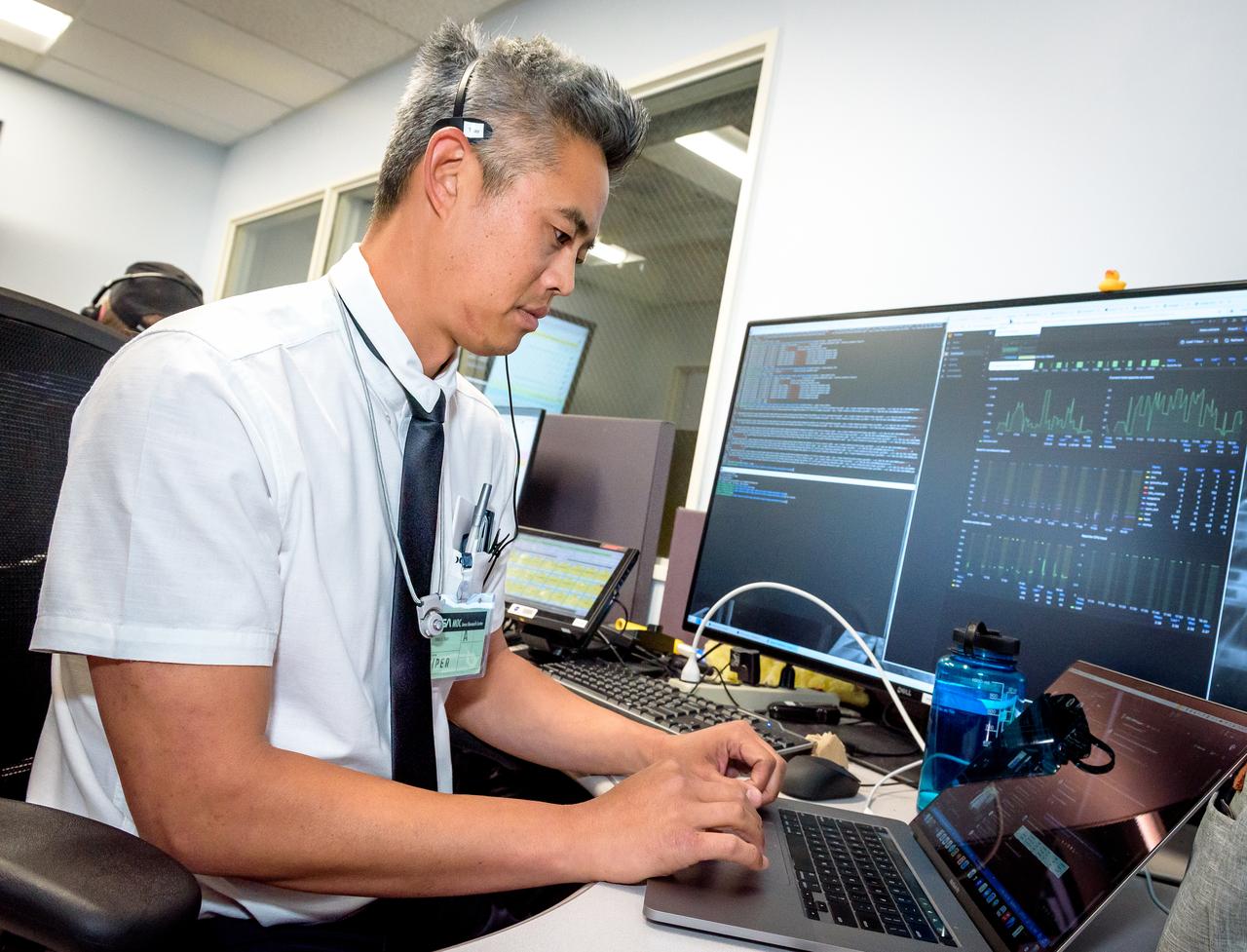 David Tsay during the Volatiles Investigating Polar Exploration Rover (VIPER) vehicle operational readiness test in the Multi-Mission Operations Center (MMOC), N240A.