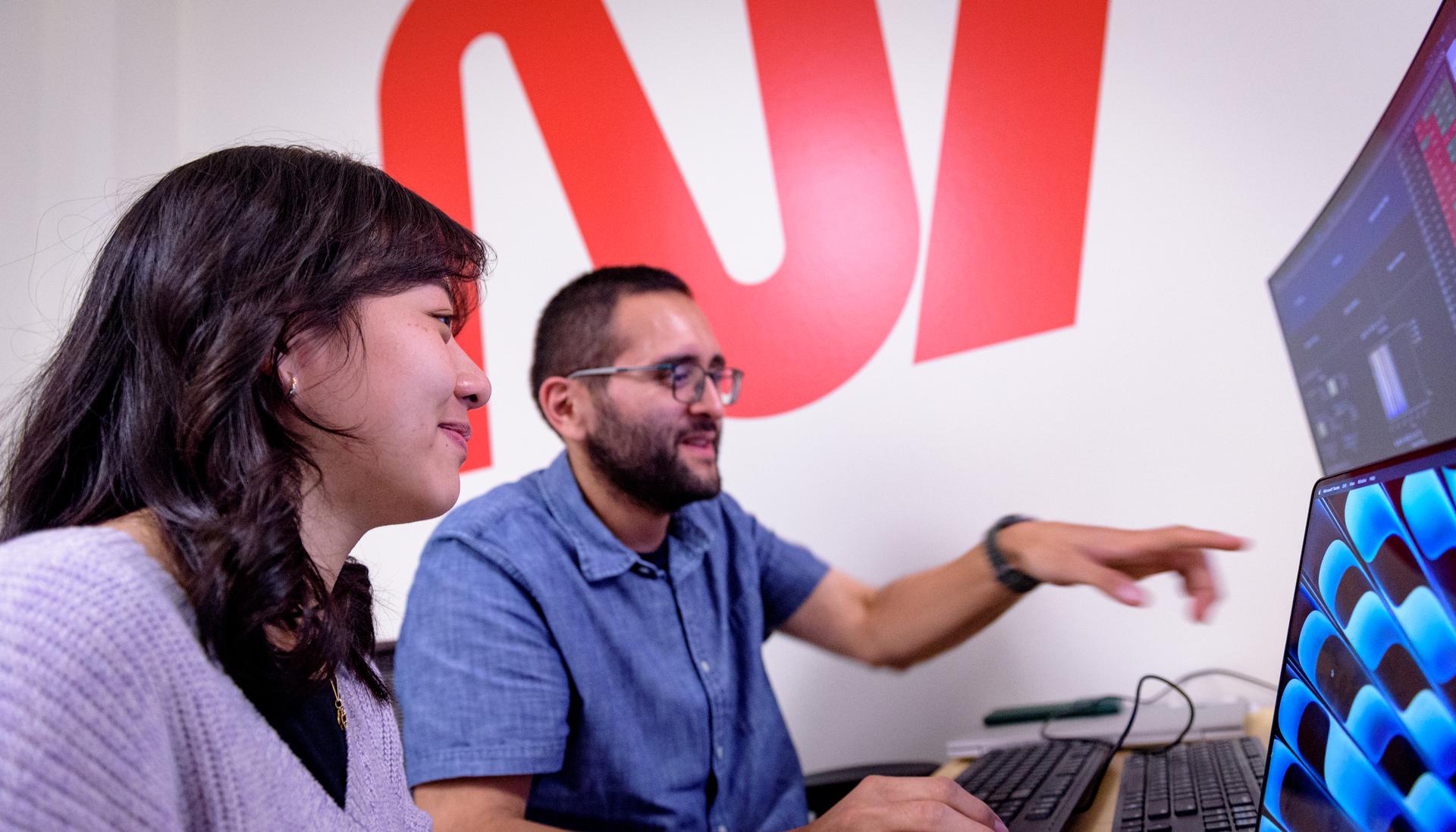TechEdSat-11 operators Daphne Dao, left, and Alejandro Salas, in the Ames Multi-Mission Operations Center (MMOC), N240 Annex, Eros control room 162. The team monitors the spacecraft's status during the Exo-Brake “parachute” deployment.   The ExoBrake is a drag device that increases the total surface area of the spacecraft to assist with a quicker deorbit. This maneuver is deployed at the end of mission to satisfy NASA's deorbit requirement and prevent space debris. TechEdSat has spent the last several months coordinating with NASA’s Conjunction Assessment Risk Analysis (CARA) team to ensure the spacecraft can safely deploy the ExoBrake without colliding into any other objects.
