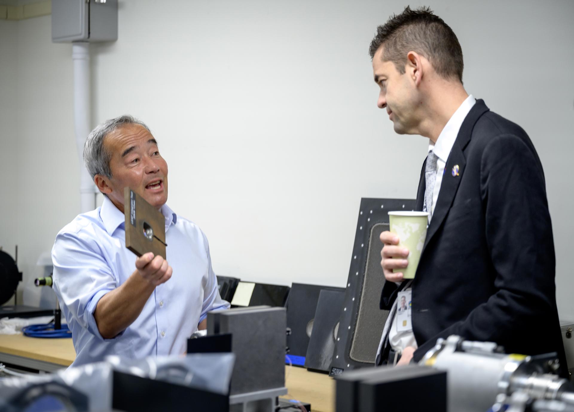 NASA Administrator Jared Isaacman speaks with Dr. George Raiche, Associate Director for Exploration Technology Infrastructure during his visit to the Arc Jet facility in N238.  