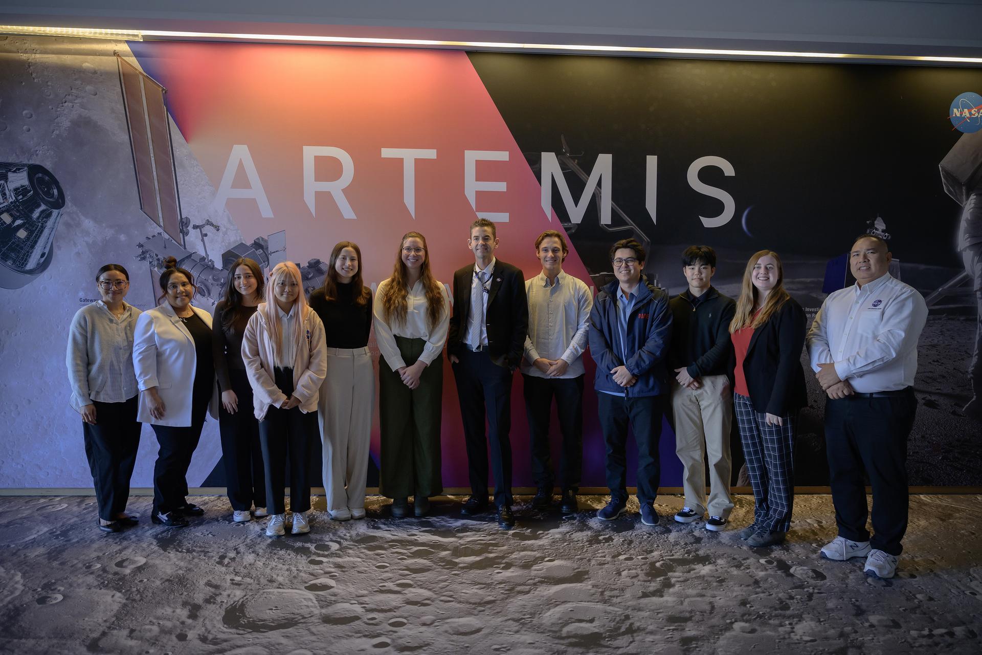 NASA Administrator Jared Isaacman, center, and OSTEM 2026 Spring Interns with Jonas Dino, right.