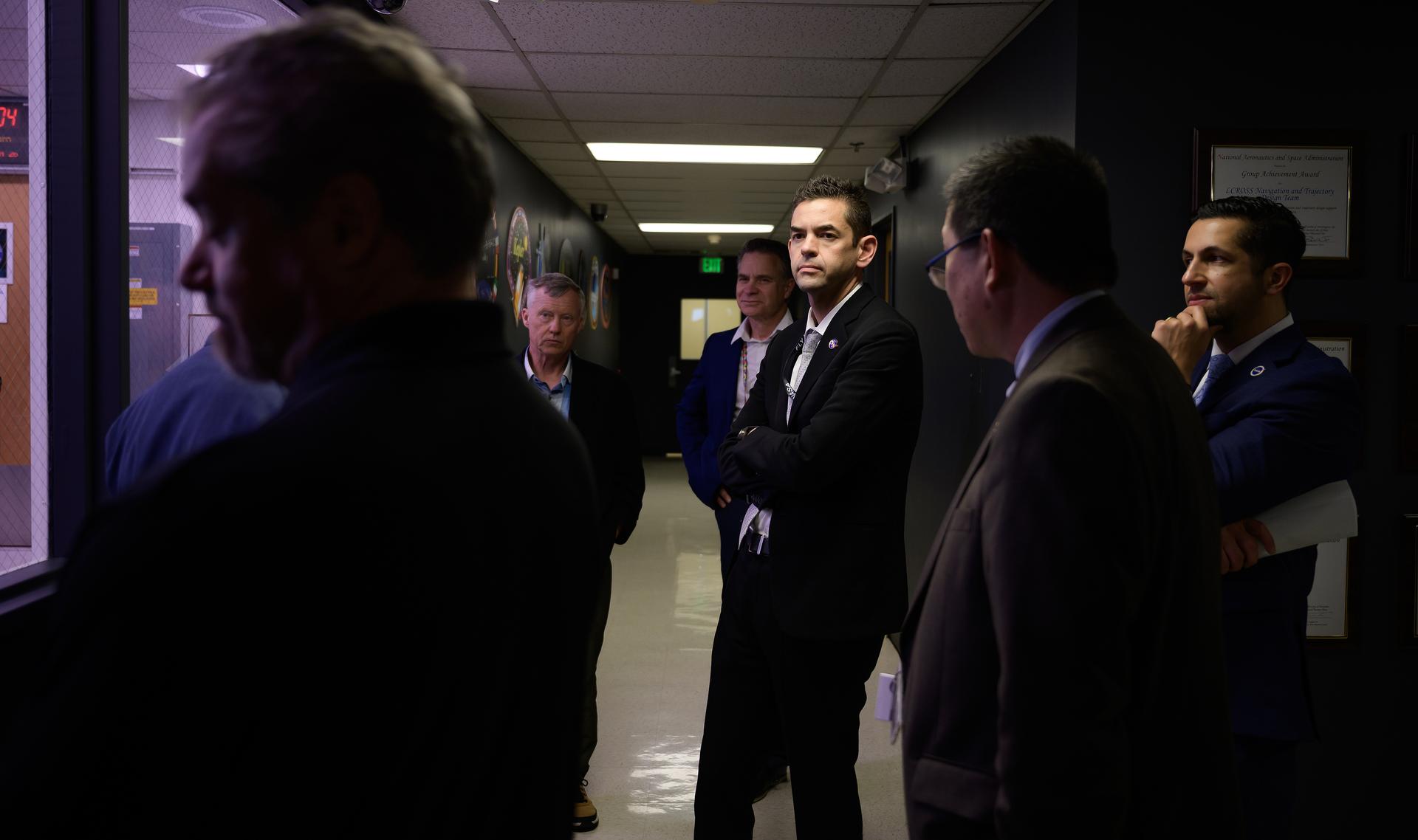 NASA Administrator Jared Isaacman, with Center Director Eugene Tu, and Associate Center Director Amir Deylami, tours the Multi-Mission Operations Center (MMOC) in N240A.  