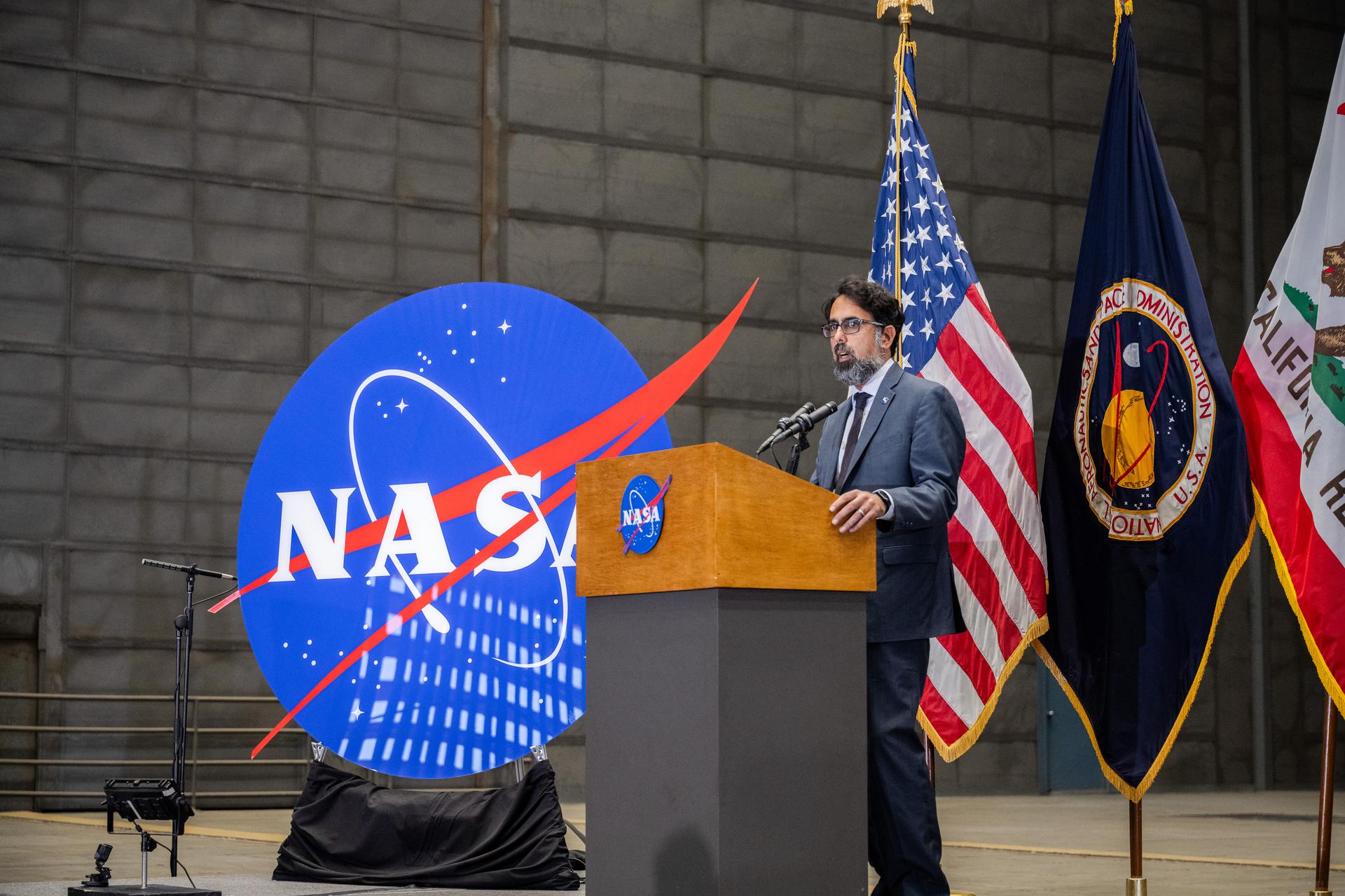 Associate Administrator Amit Kshatriya gives remarks at the NASA Civil Servant Swearing-in Ceremony in the National Full-Scale Aerodynamics Complex (NFAC) 80-by-120-foot test section, N221.