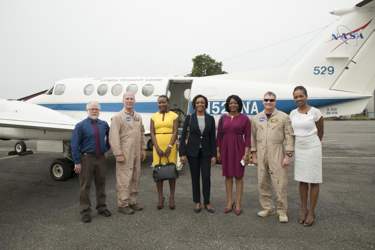 The NASA Langley Research Center-based B-200 in Gabon, Africa, was visited by three representatives of the Gabon Ministry of the Numerical Economy (the three women seen in the middle). In the photo from left are Bryan Blair, Rick Yasky, the three Gabon representatives, Alan Barringer and Lola Fatoyinbo.