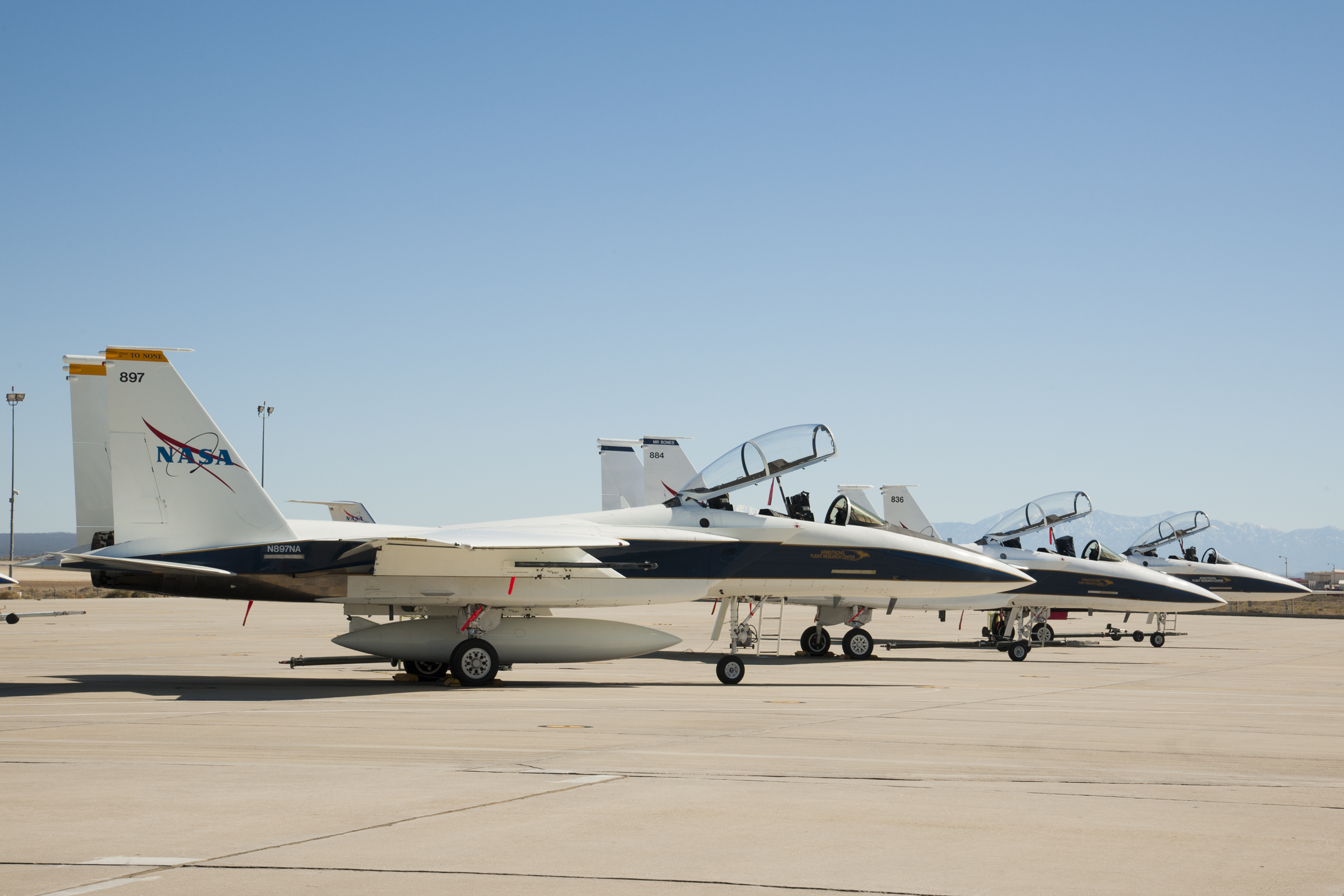 Left to right: "2nd to None" (F-15D #897), "Mr. Bones" (F-15D #884), and workhorse F-15B #836 on the back ramp at NASA's Neil A. Armstrong Flight Research Center.