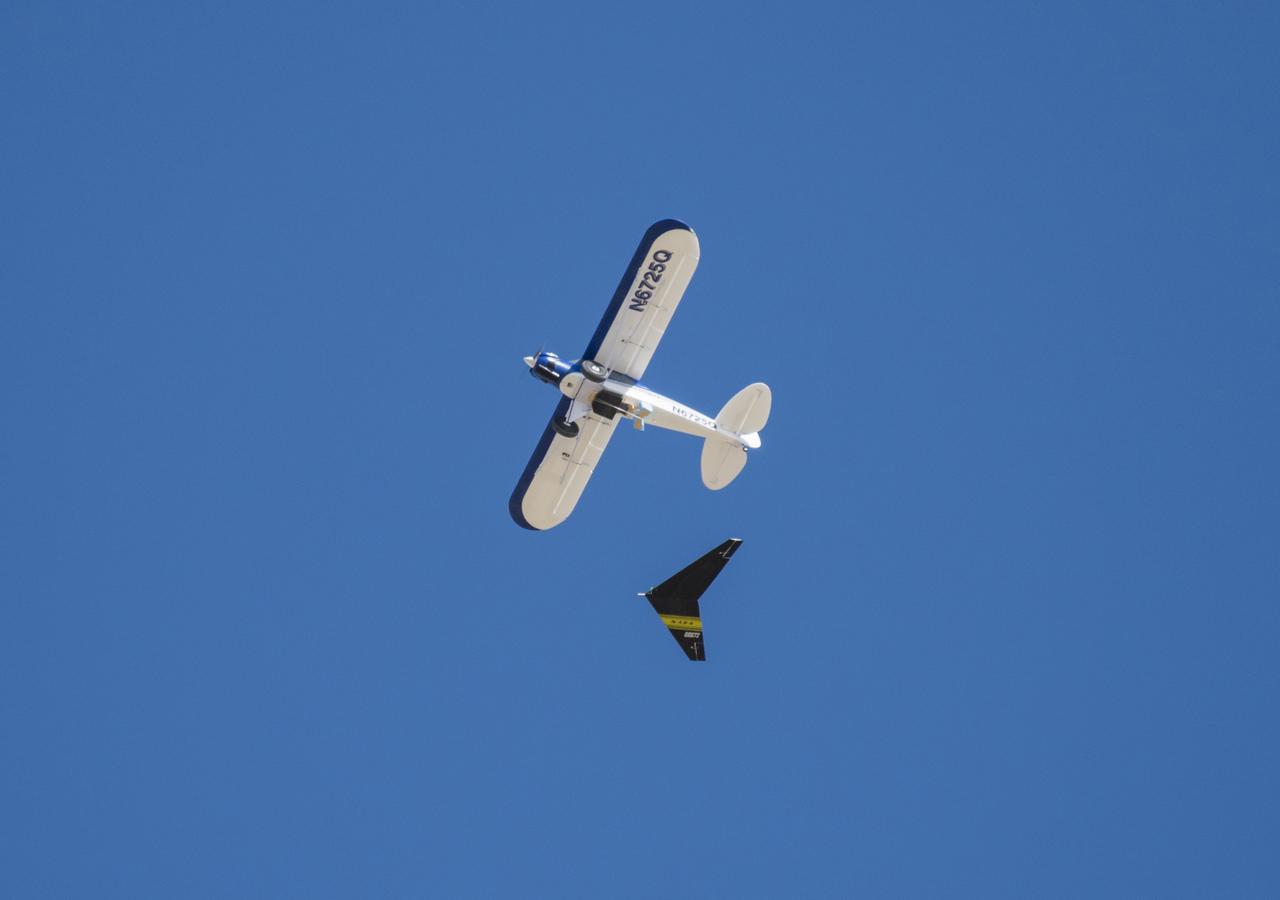 A Prandtl-M aerodynamic model flies following an air launch from a remotely piloted Carbon Cub.