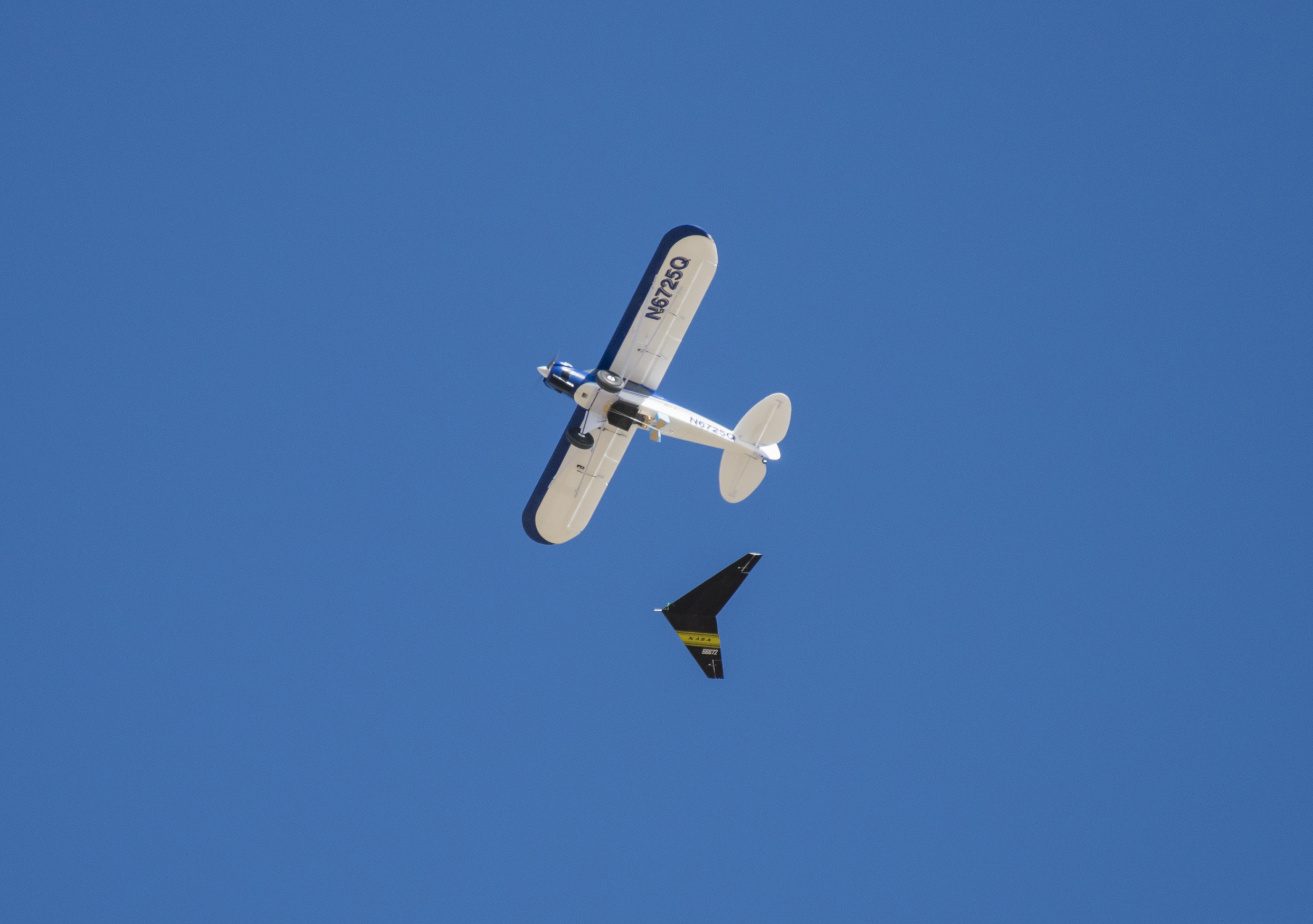 A Prandtl-M aerodynamic model flies following an air launch from a remotely piloted Carbon Cub.