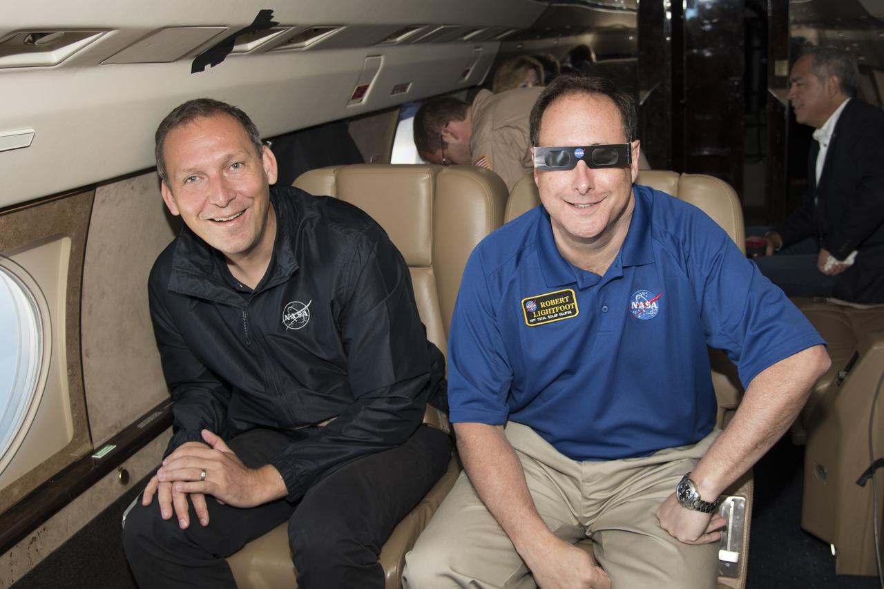 NASA's Thomas Zurbuchen, AA for science missiond directorate and NASA's Robert Lightfoot, acting administrator, waiting for partial eclipse to occur. Photo Credit: (NASA/Carla Thomas)