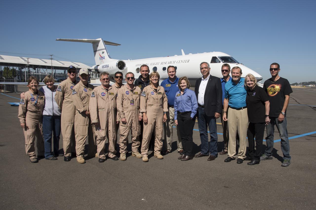 NASA Armstrong and NASA senior management Gulfstream III team pose for group shot by aircraft after return from covering Total solar eclipse. Photo Credit: (NASA/Carla Thomas)