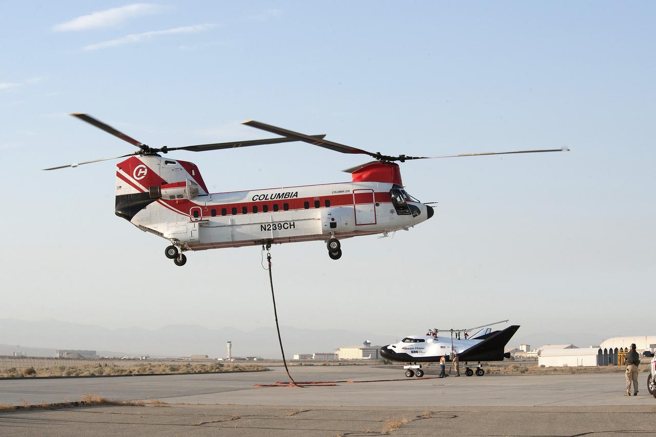 Sierra Nevada Corporation's (SNC) Dream Chaser® being lifted by Columbia 234 UT helicopter for a captive carry flight test on Wednesday, Aug. 30 at NASA Armstrong Flight Research Center.