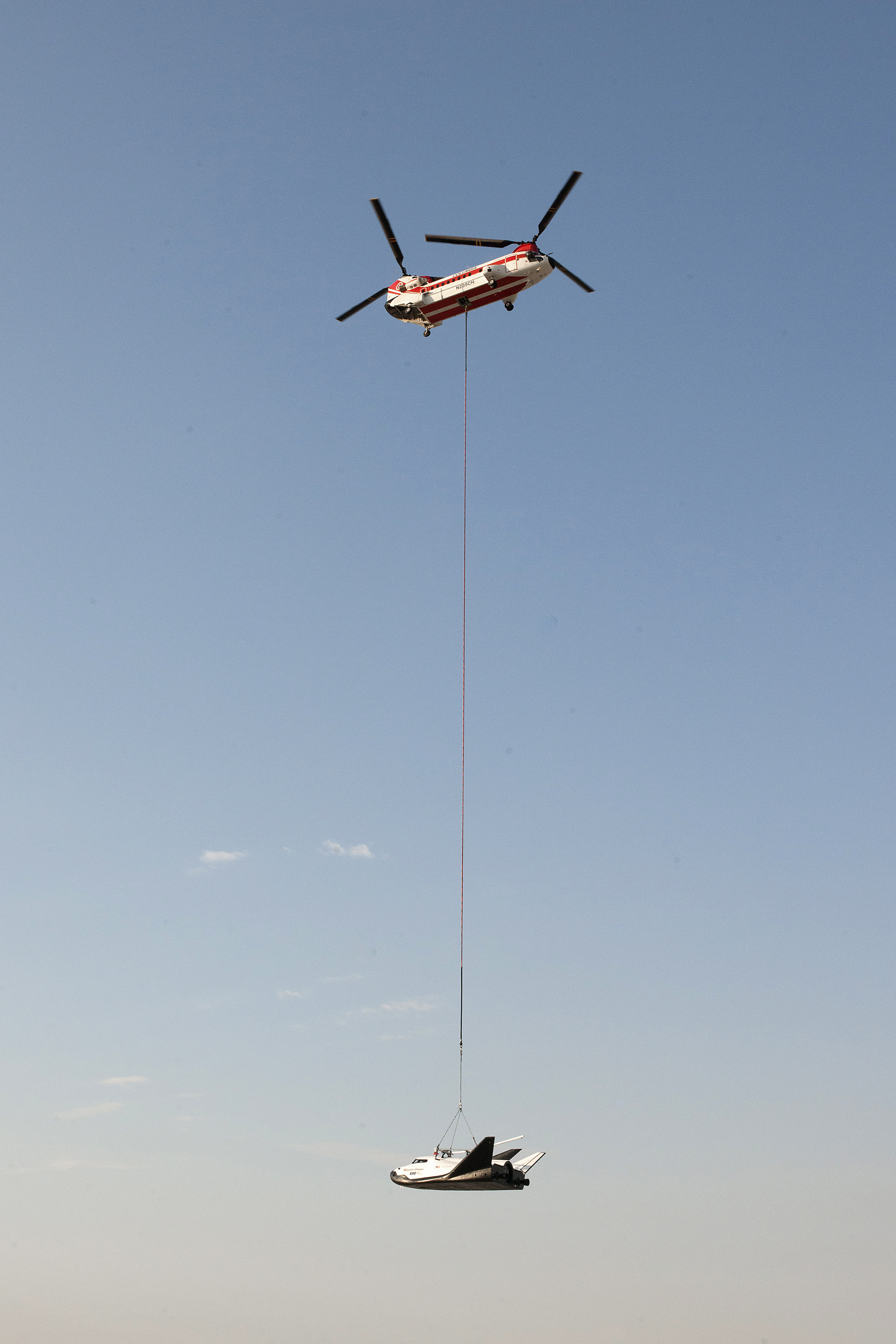 Sierra Nevada's Dream Chaser lifted off ramp on Wednesday, Aug. 30 at NASA Armstrong Flight Research Center by Columbia 234 UT helicopter for captive carry flight.