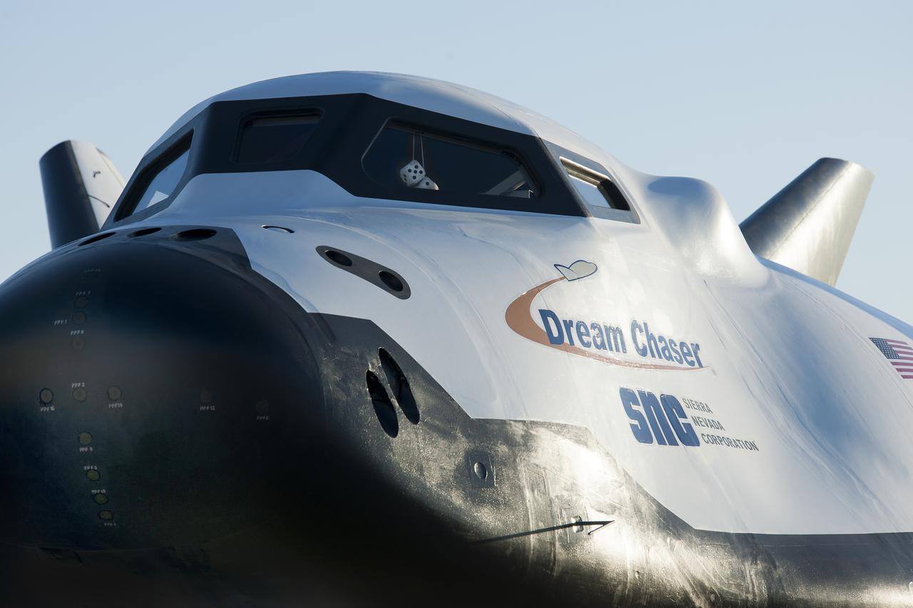 Sierra Nevada Corp’s Dream Chaser posed on ramp at sunrise at NASA Armstrong Flight Research Center in California where the aircraft has gone through a series of tests in preparation for flight.