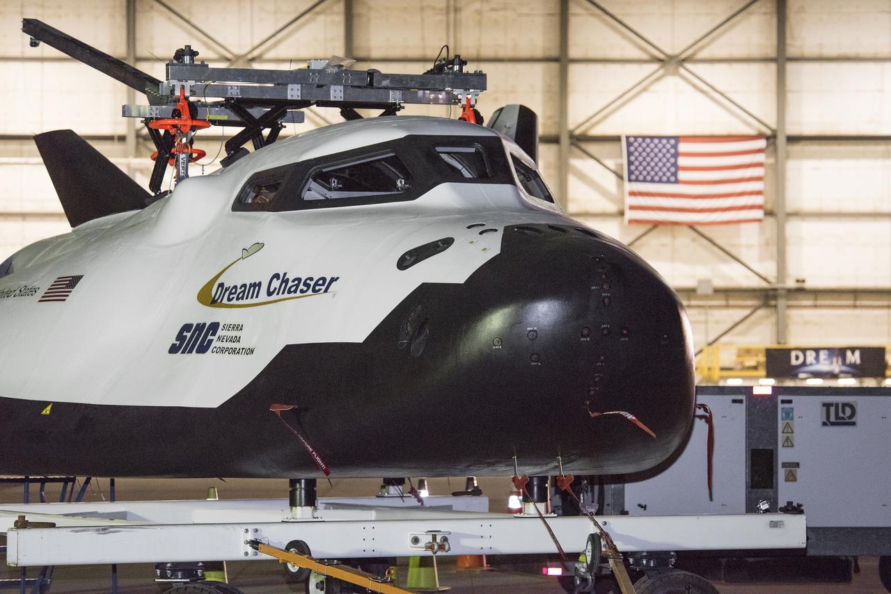 A lift device was attached to Sierra Nevada Corp’s Dream Chaser for a helicopter to pick it up to drop for its successful approach and landing test at NASA’s Armstrong Flight Research Center in California on Nov. 11, 2017. 