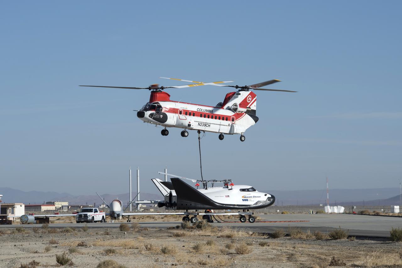 Sierra Nevada Corp’s Dream Chaser was lifted by helicopter from the ramp at NASA’s Armstrong Flight Research Center in Edwards, California, before its successful approach and landing flight test on Nov. 11, 2017.