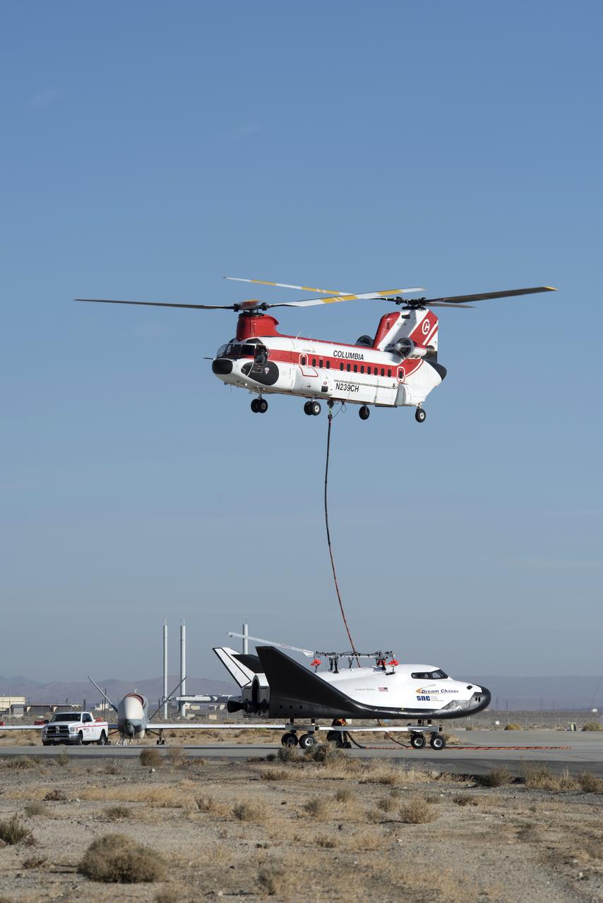 Sierra Nevada Corp’s Dream Chaser was lifted by helicopter from the ramp at NASA’s Armstrong Flight Research Center in Edwards, California, before its successful approach and landing flight test on Nov. 11, 2017.