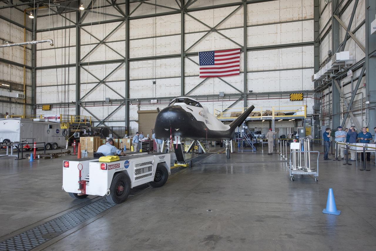 After a successful approach and landing flight test on Nov. 11, 2017, Sierra Nevada Corp’s Dream Chaser was towed back to NASA Armstrong Flight Research Center in California, and placed in the former space shuttle hangar.