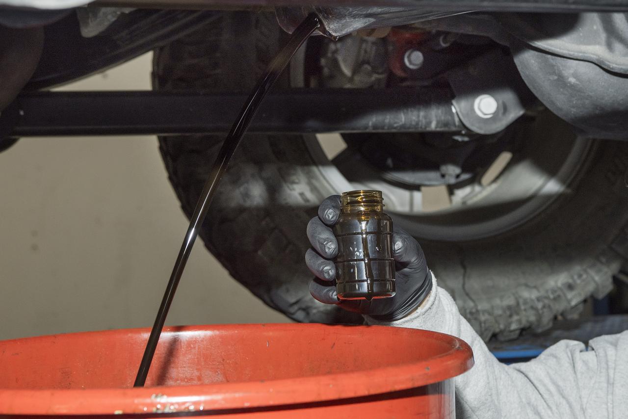 Before new bio-based synthetic oils were added to Armstrong vehicles, the old oil was drained and sent to a lab for analysis to compare to the new lubricant.