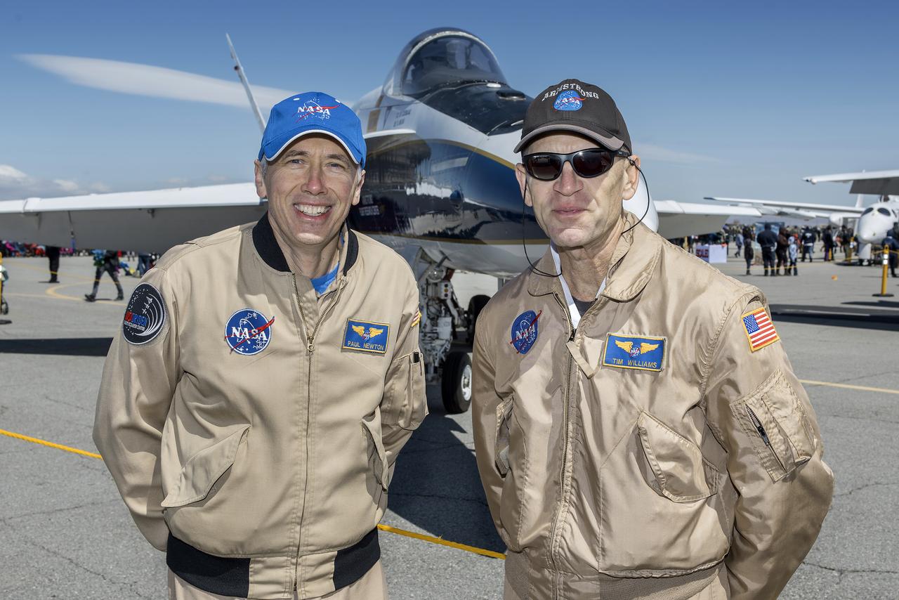 NASA Armstrong Research Center pilots Paul Newton and Tim Williams stand by the center’s F/A-18 research aircraft.