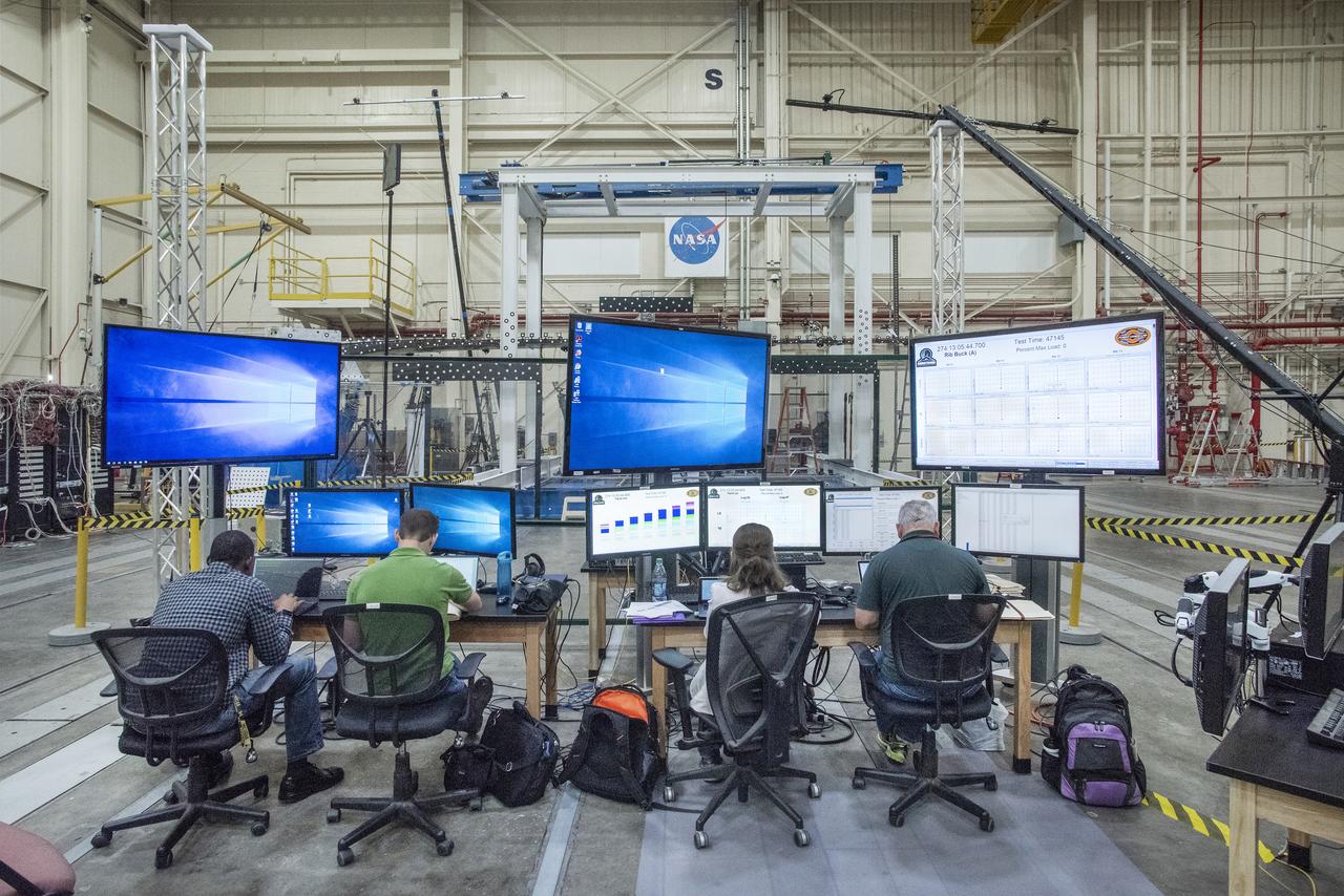 NASA’s Armstrong Flight Research Center and Langley Research Center staff members monitor a test of the Passive Aeroelastic Tailored (PAT) wing at NASA’s Armstrong Flight Research Center in California.