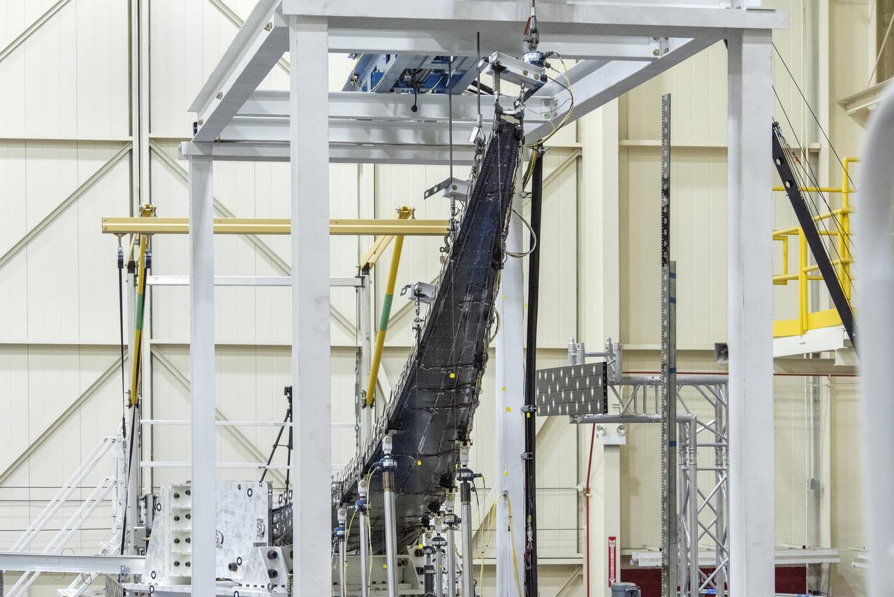 The Passive Aeroelastic Tailored (PAT) wing bends under pressure from the highest loads applied during testing at NASA’s Armstrong Flight Research Center in California.