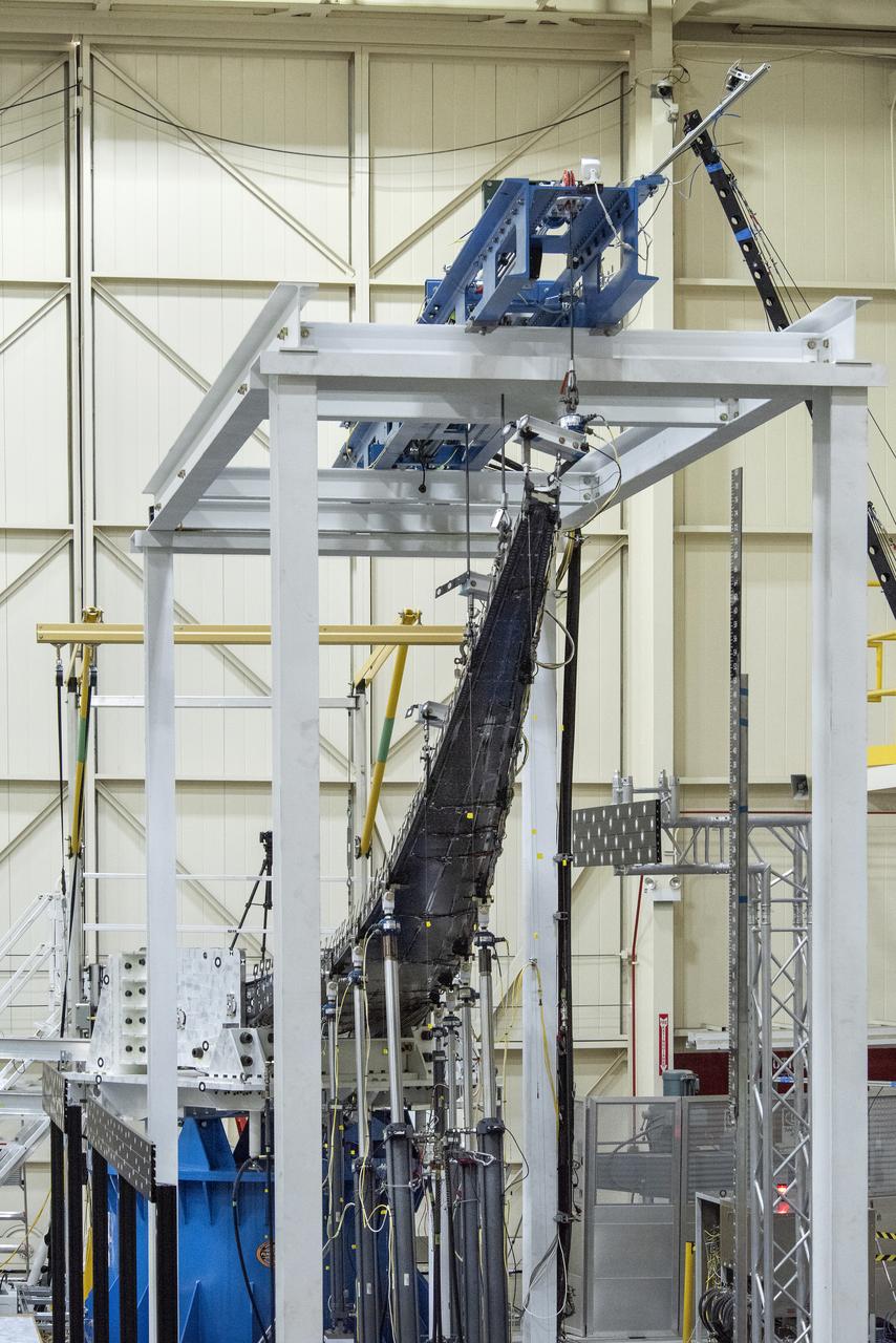 The Passive Aeroelastic Tailored (PAT) wing bends under pressure from the highest loads applied during testing at NASA’s Armstrong Flight Research Center in California.