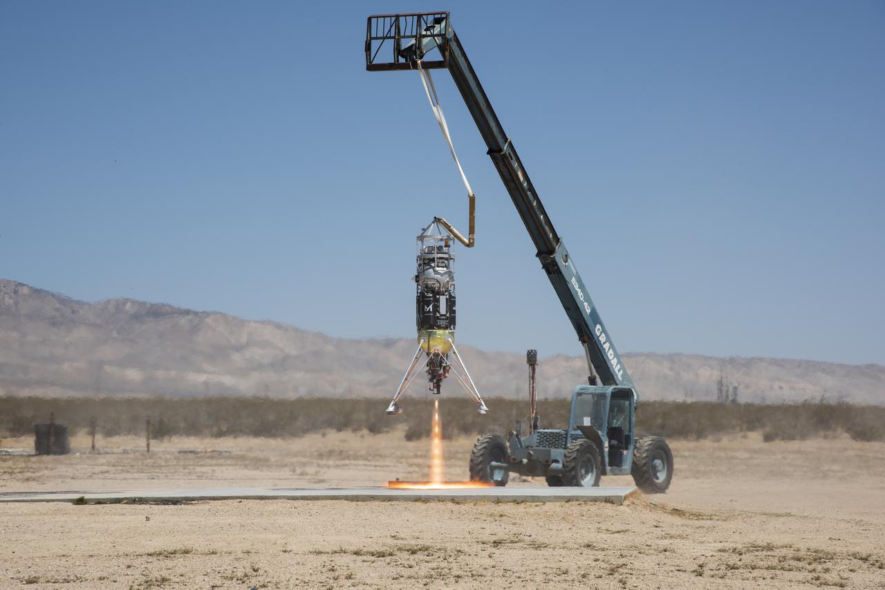 Masten Space Systems’ Xodiac rocket flight tests Honeybee Robotics pneumatic sampler collection system, PlanetVac, in Mojave Desert.