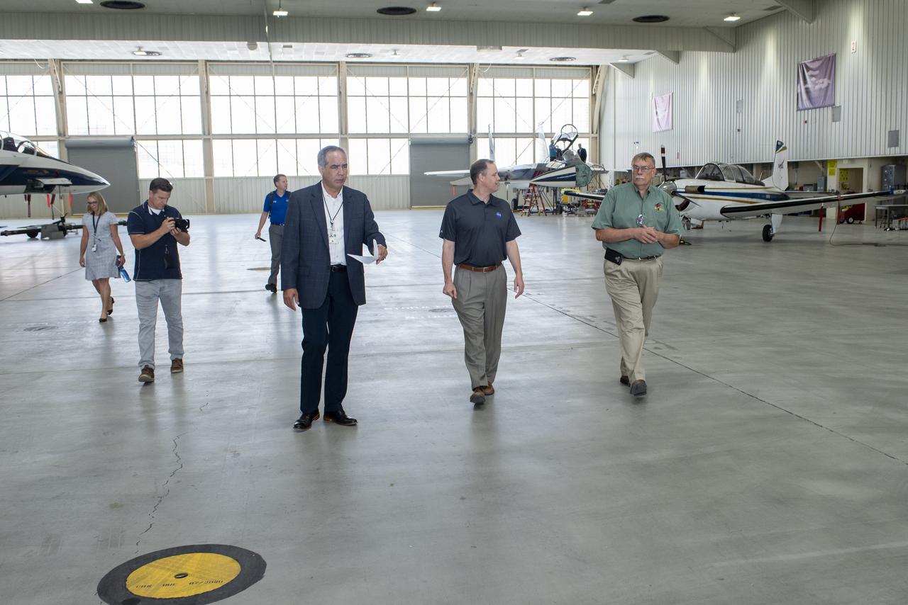 Bridenstine tours main Armstrong hangar that houses the center aircraft used for flight research and safety chase such as F/A-18, F-15B/D, King Air B-200, T-34C and TG-14 aircraft.