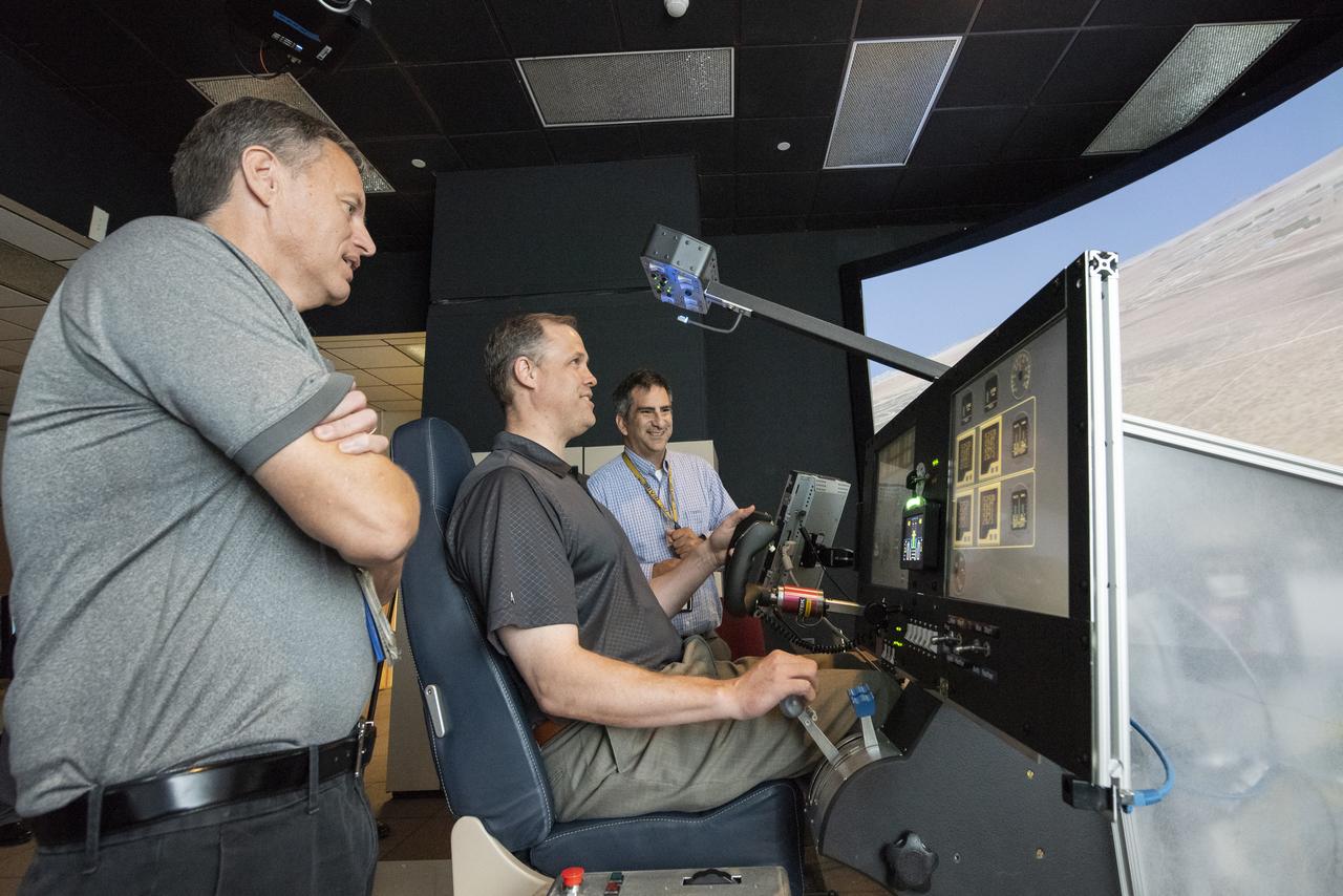 NASA Administrator Bridenstine tests the X-57 "Maxwell" simulator at NASA's Armstrong Flight Research Center. The simulator is designed to provide feedback to NASA test pilots based on the aircraft's unique design and distributed electric propulsion system.
