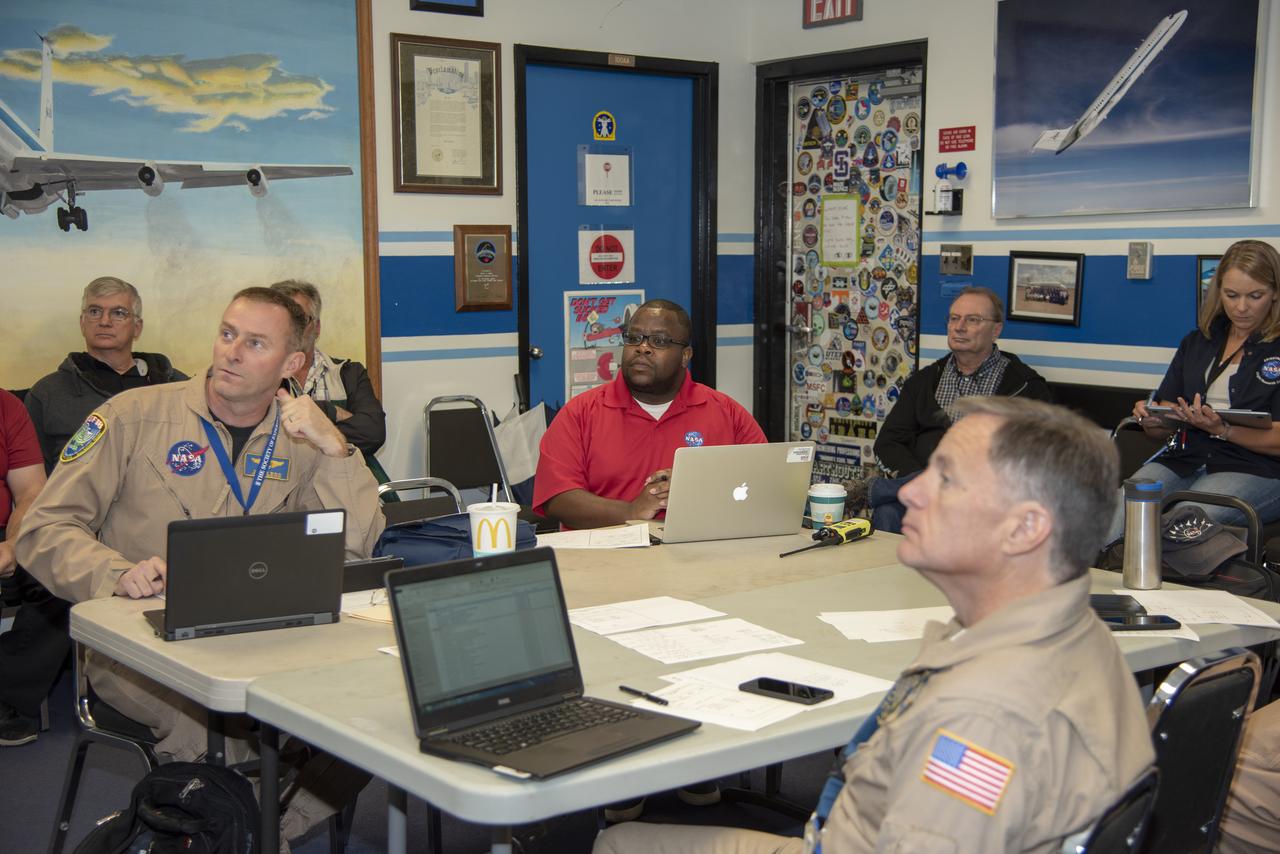 NASA pilots, engineers, and communications specialists brief the day’s operations prior to a supersonic research flight for QSF18, taking off from Ellington Field in Houston, Texas. The flights are meant to validate NASA’s techniques and technology for gather community feedback data for X-59’s Low-Boom Flight Demonstration mission.