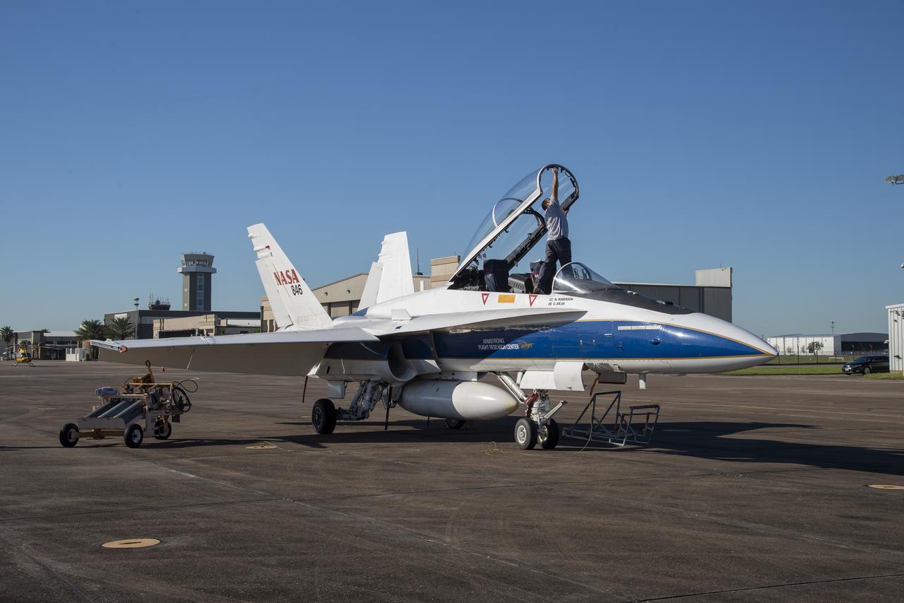 NASA's F/A-18 research aircraft stands ready prior to a QSF18 supersonic research flight off the coast of Galveston, Texas.