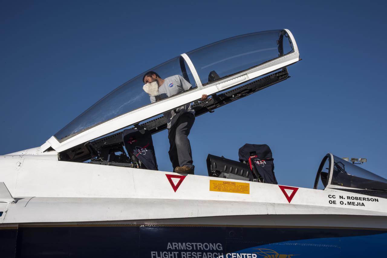 NASA’s F/A-18 research aircraft stands ready prior to a QSF18 supersonic research flight off the coast of Galveston, Texas.