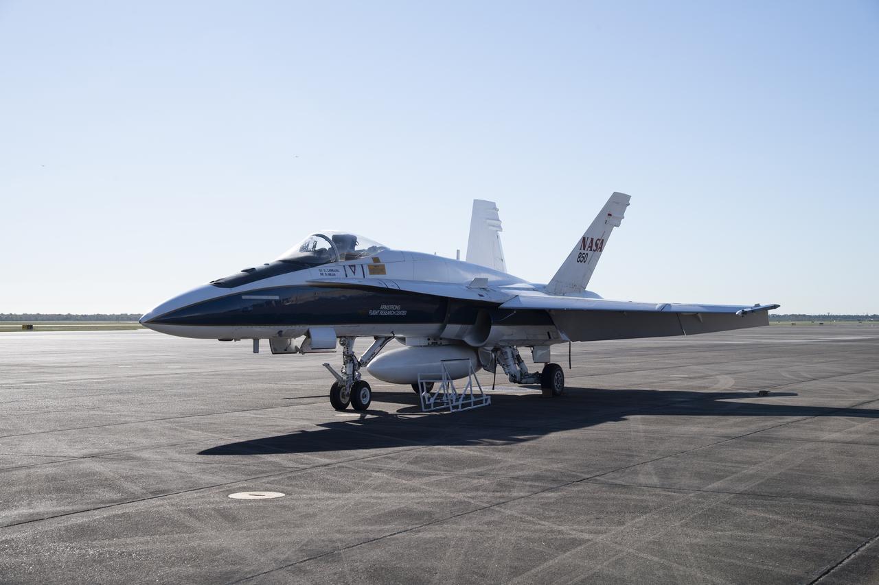 NASA's F/A-18 research aircraft stands ready prior to a QSF18 supersonic research flight off the coast of Galveston, Texas.