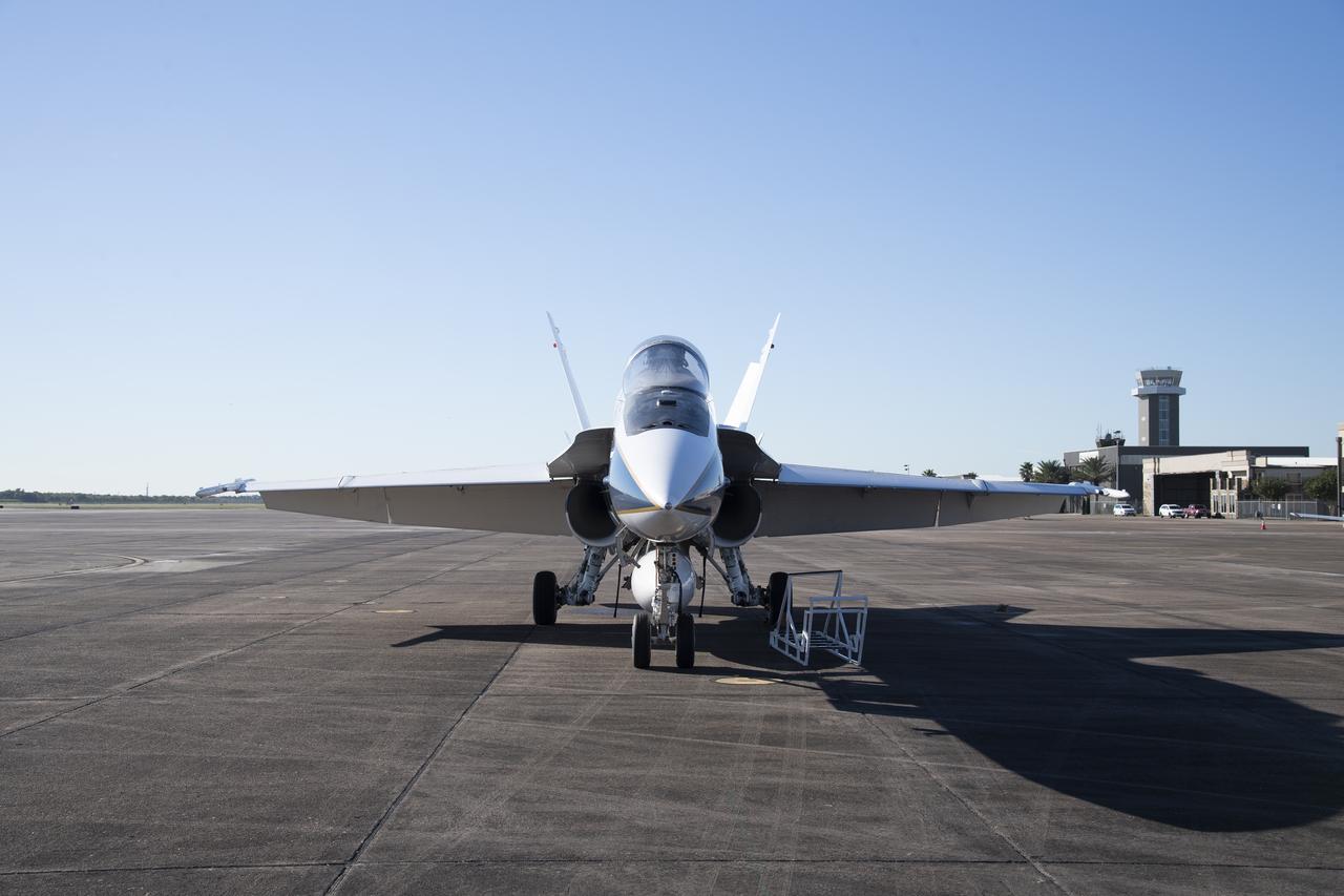 NASA's F/A-18 research aircraft stands ready prior to a QSF18 supersonic research flight off the coast of Galveston, Texas.