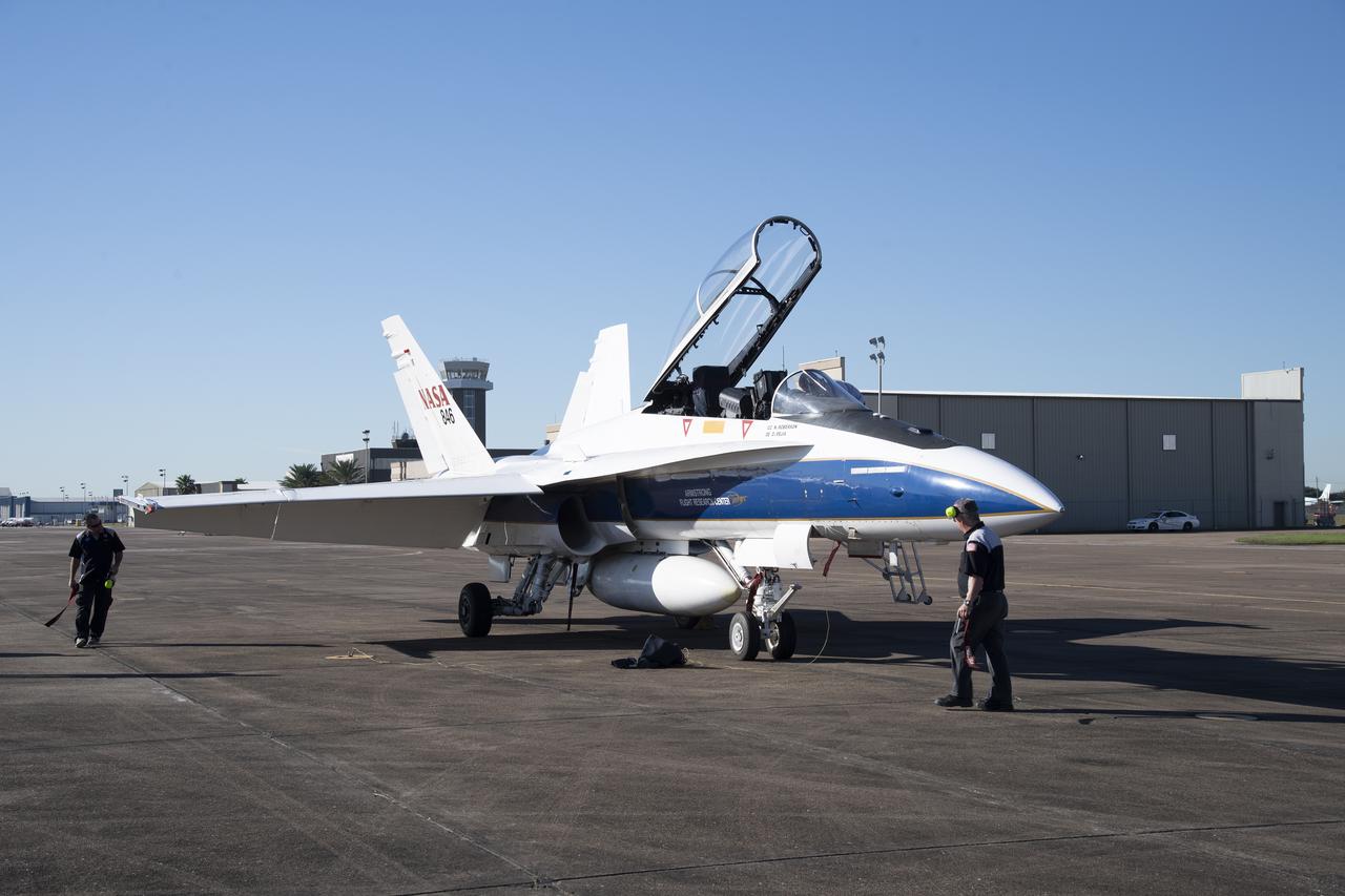 NASA's F/A-18 research aircraft stands ready prior to a QSF18 supersonic research flight off the coast of Galveston, Texas.