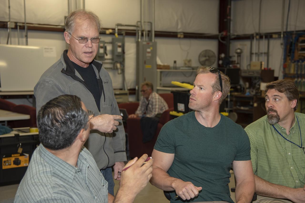 NASA mission controllers, engineers, pilots and communications specialists in the mission control room monitor the supersonic research flight off the coast of Galveston, as part of the QSF18 flight series. The flight operations crew tracks the status of the flights, maintains communications with the aircraft, communicates with U.S. Coast Guard, and coordinates community feedback data.