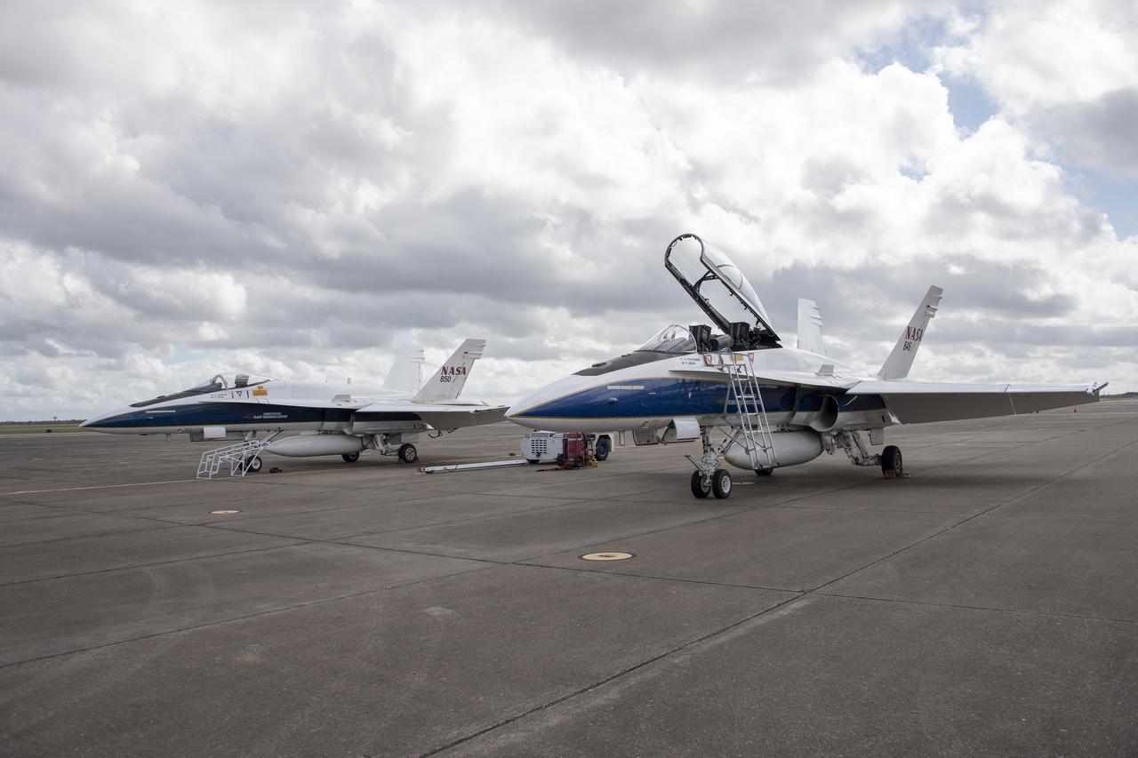 NASA's F/A-18 research aircraft stands ready prior to a QSF18 supersonic research flight off the coast of Galveston, Texas.