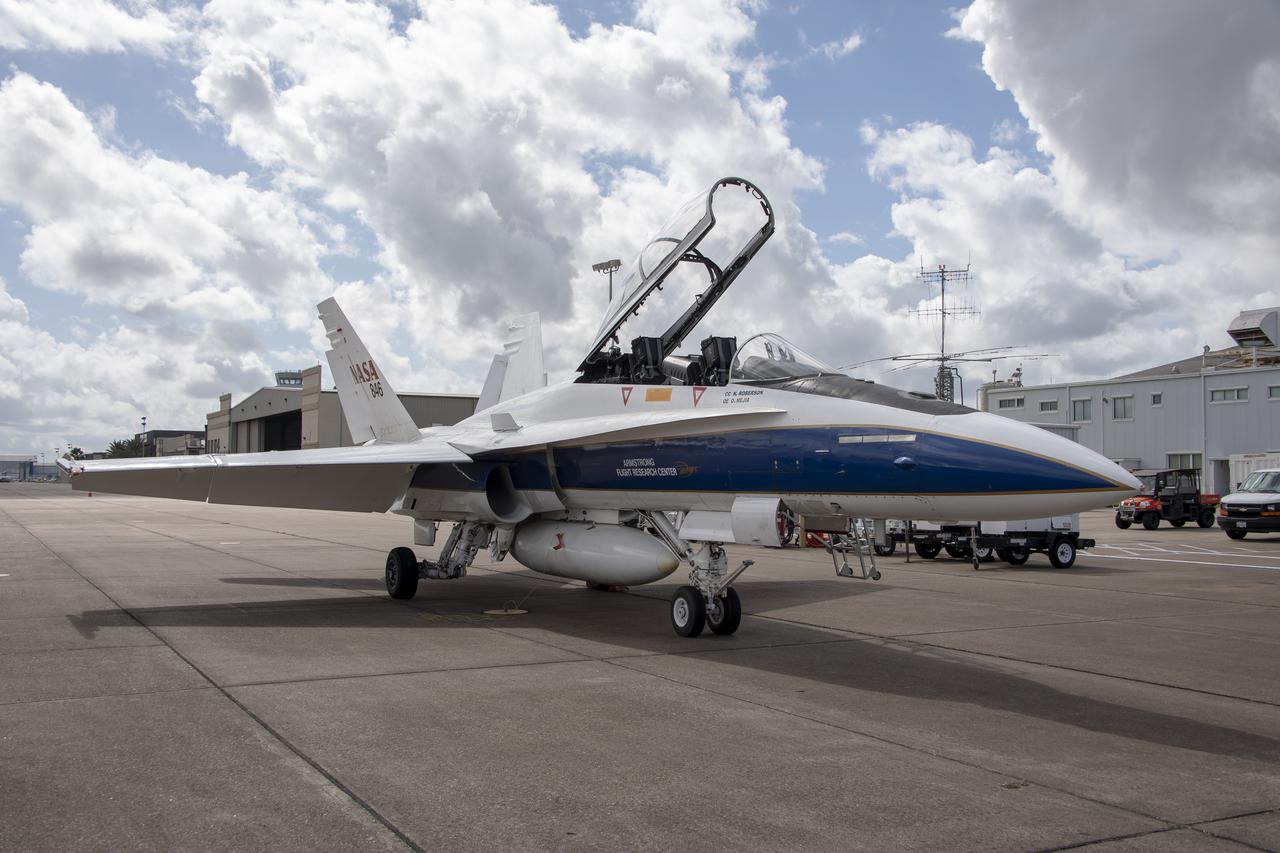 NASA’s F/A-18 research aircraft stands ready prior to a QSF18 supersonic research flight off the coast of Galveston, Texas.