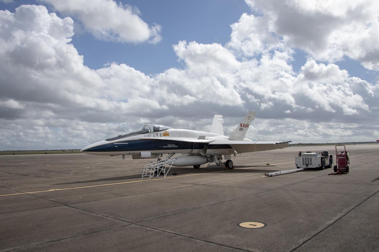 NASA's F/A-18 research aircraft stands ready prior to a QSF18 supersonic research flight off the coast of Galveston, Texas.