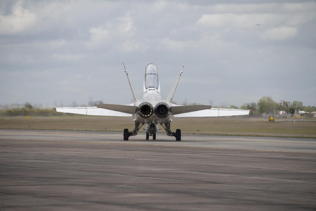 NASA ground and maintenance crews prepare the F/A-18 research aircraft for a supersonic research flight off the coast of Galveston, Texas in support of the QSF18 flight campaign. These crews are vital to making sure the aircraft is ready to operate safely and efficiently for NASA’s research.